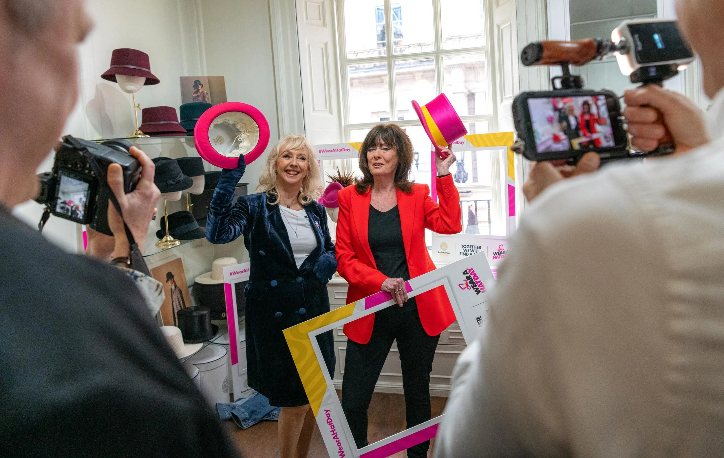 Debbie McGee and Vicki Michelle at the Brain Tumour Research Wear A Hat Day event at Lock & Co. Hatters in London.