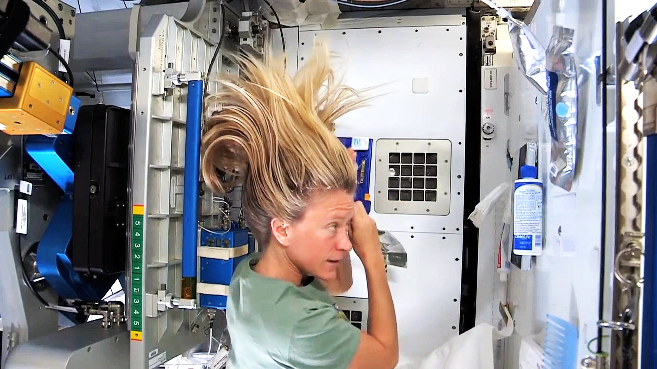 Astronaut Washing Hair In Space