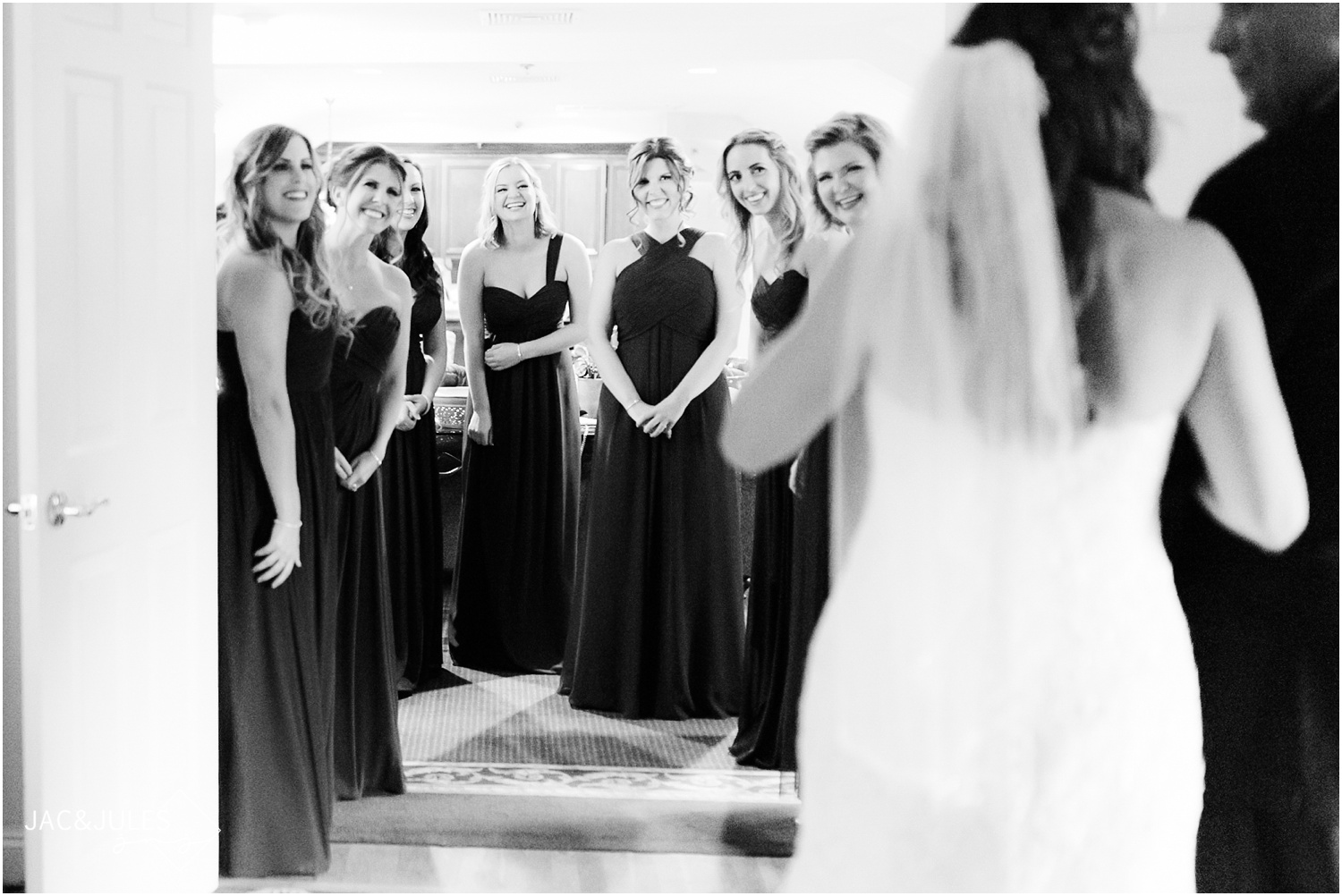 First look with bridesmaids at The Olde Mill Inn in Basking Ridge, NJ.