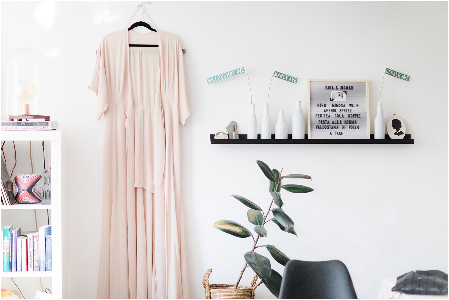 Boho style wedding dress hanging in free spirit Rotterdam apartment.