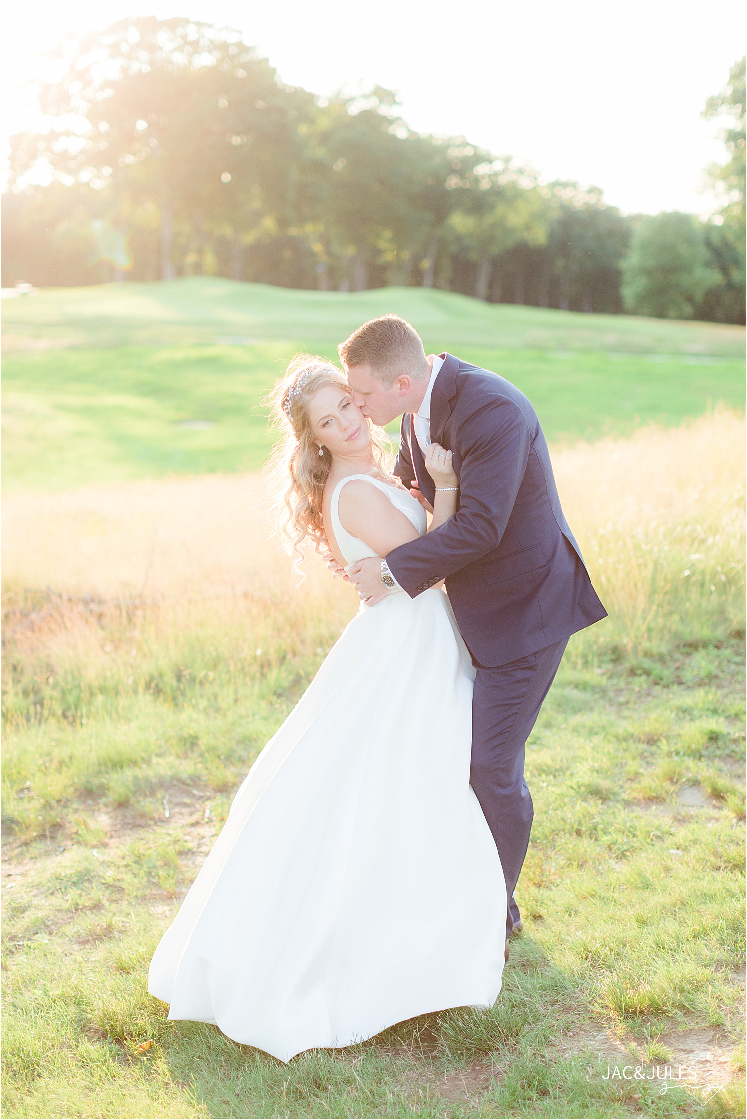 groom kisses brides cheer at country club wedding in north jersey