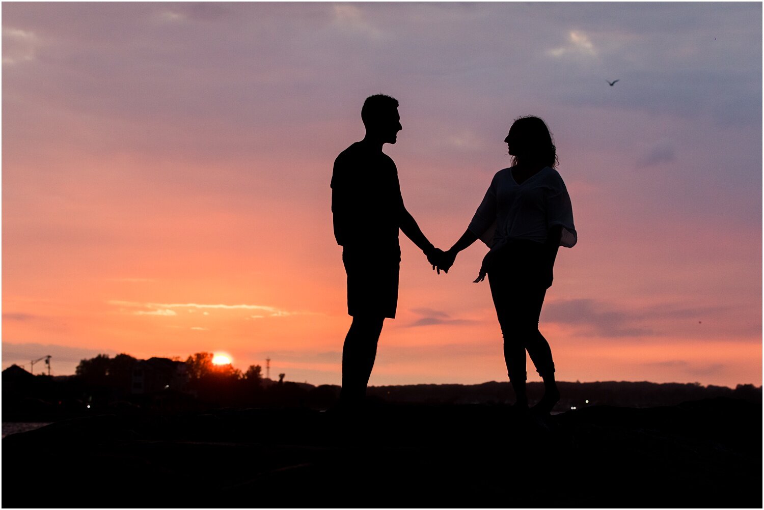 Sunset engagement photo at the Manasquan inlet.