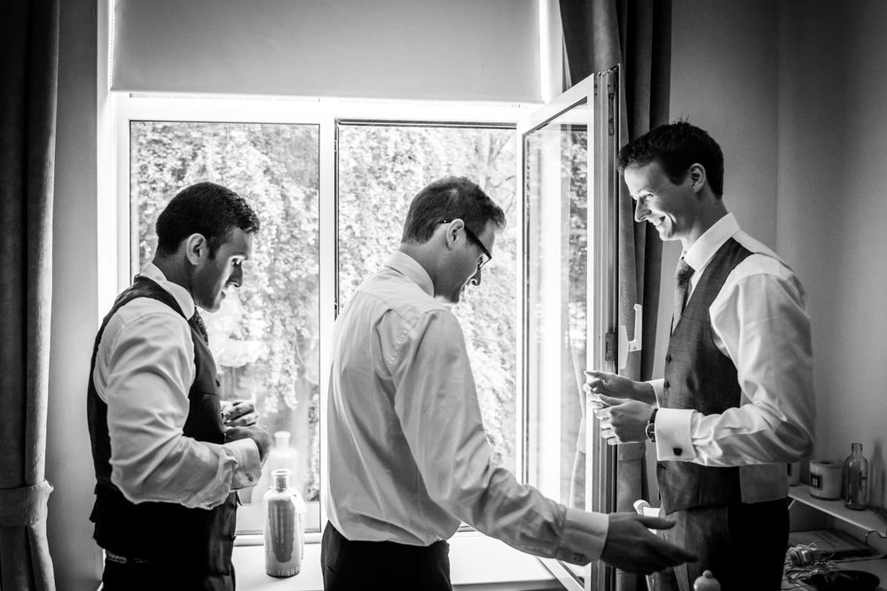 Groom is getting ready, with his best men.