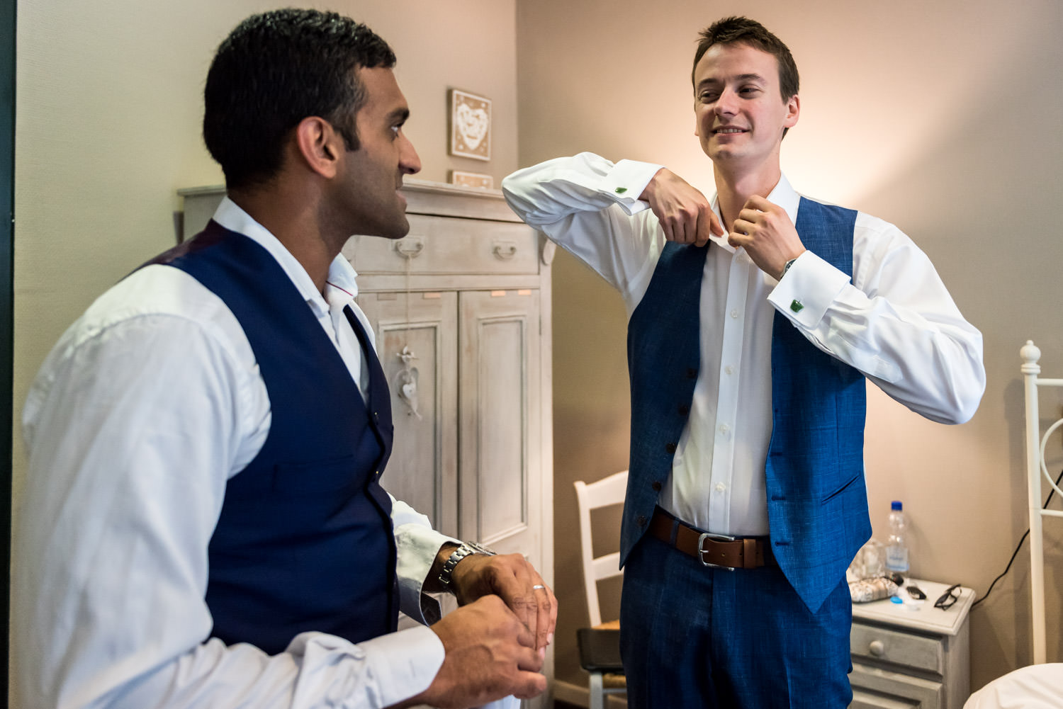 groom with his best men is getting ready