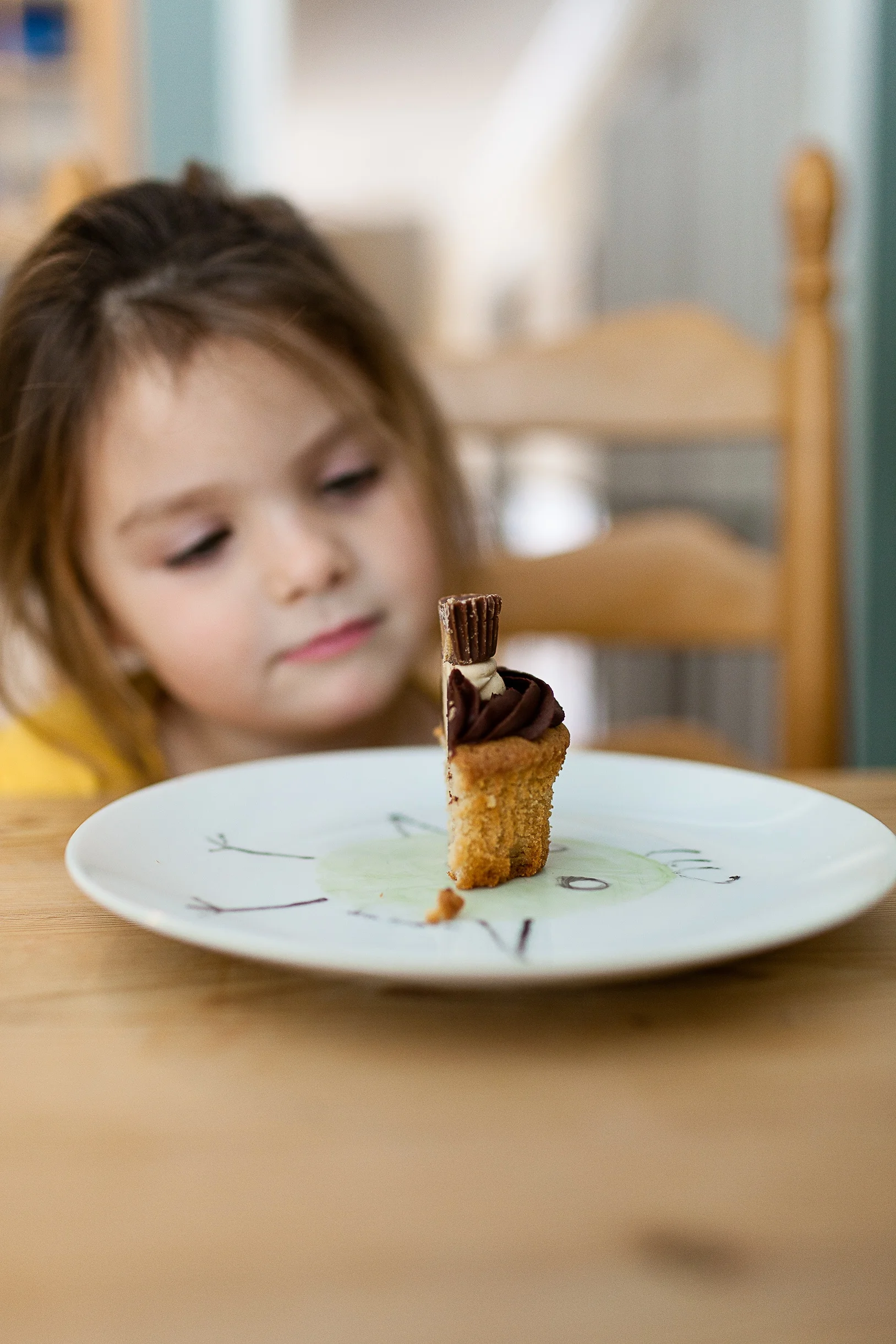 Not my kid. But she wants to know why is there only half a cupcake? And what is that icky stuff? And she doesn't like that kind! (Photo Credit: Danielle MacInnes, Unsplash.com)