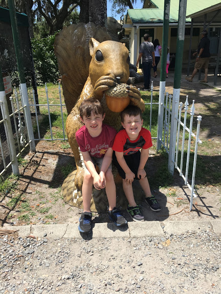 Boys with squirrel statue.JPG