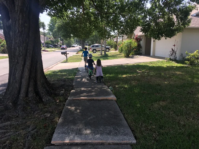 Sibling Bike Riding Rivalry