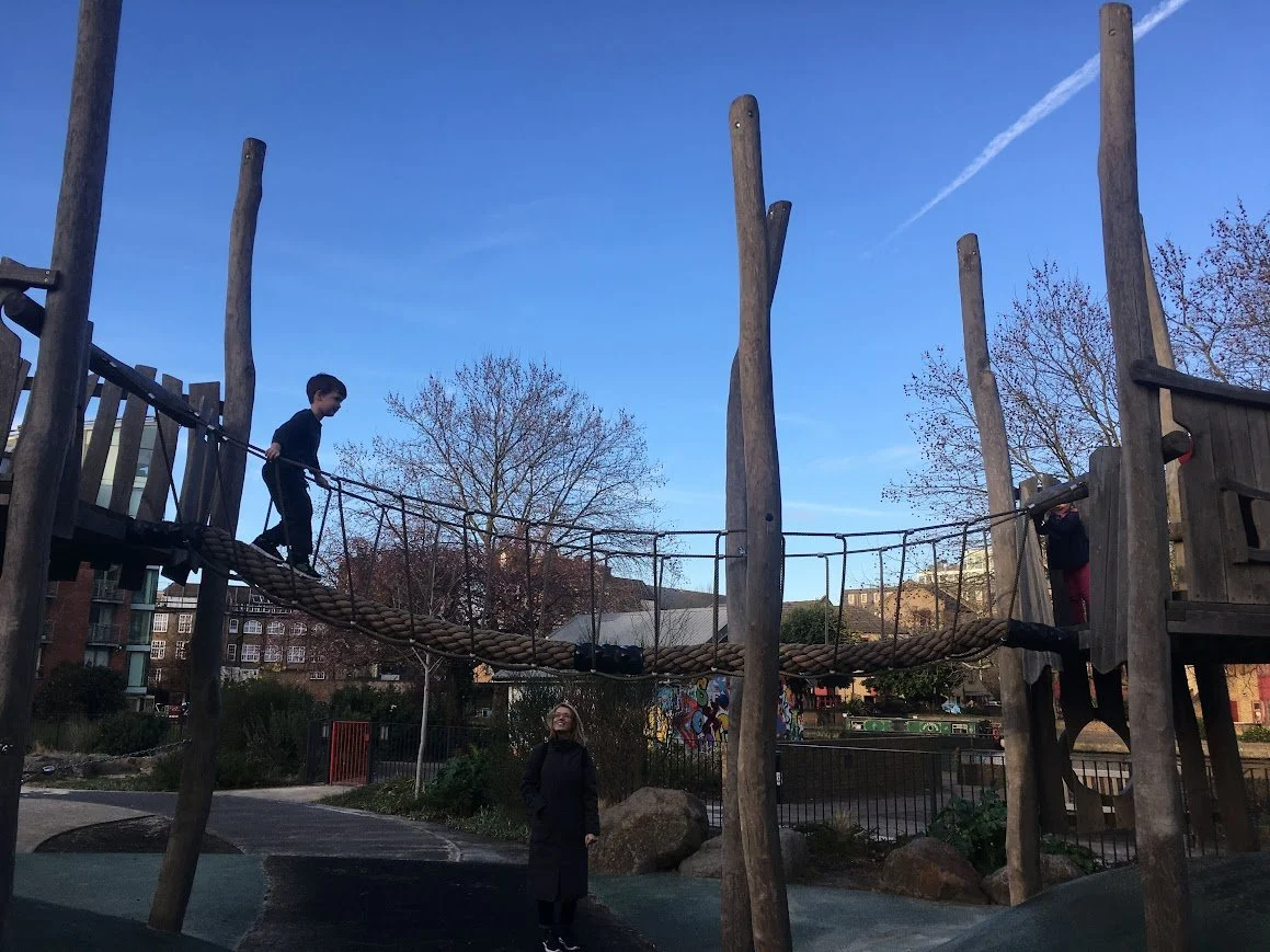 The Other Me Hangs Out With His Kids at a Small Playground in London