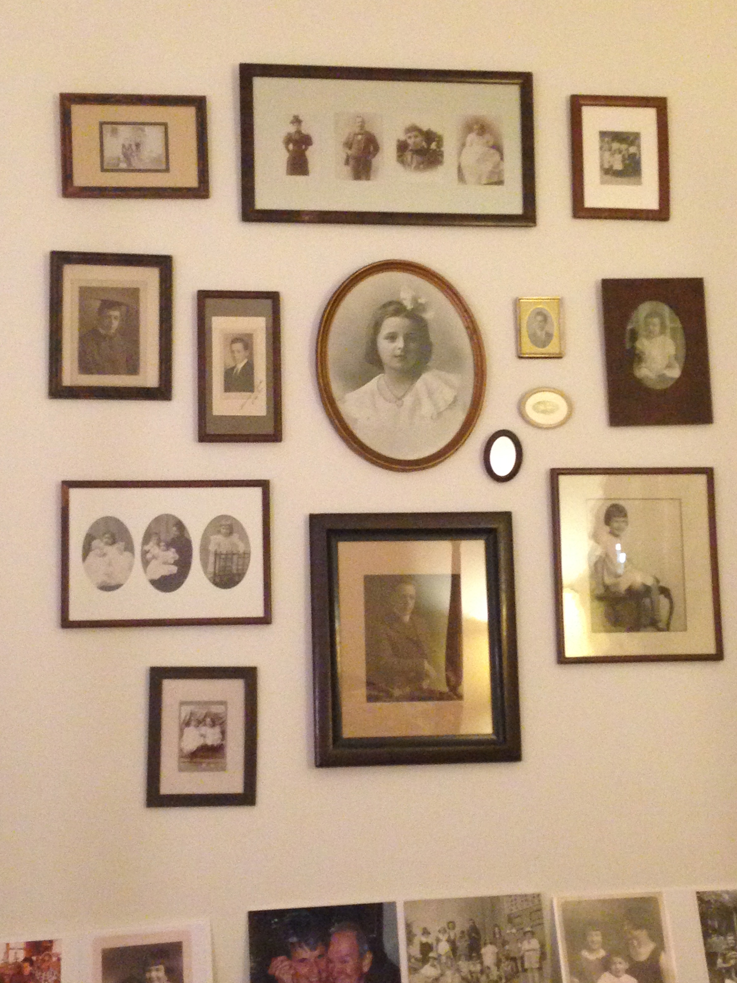  Family photos that hang across from my grandmother's bed. 