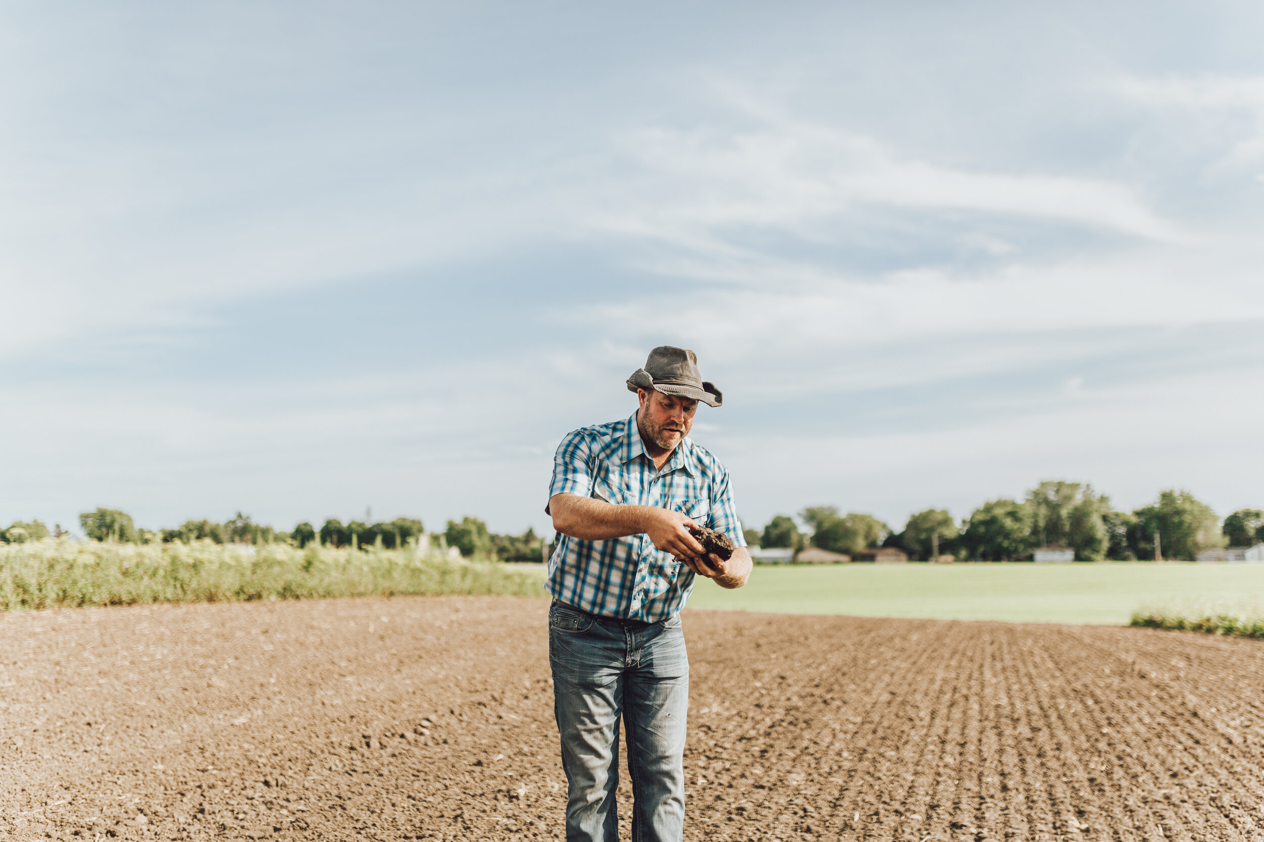 2019_0801MN_TangletownGardens_soil_dirt_farmer_IlanaFreddye2.jpg