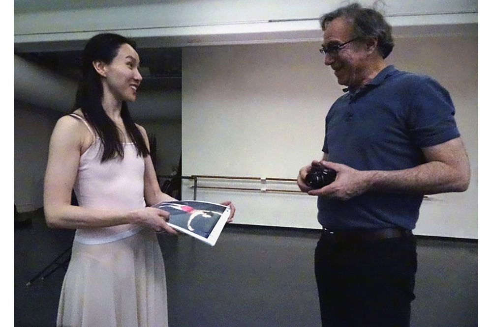 Hee Seo, Curtain Call Marc and Hee reviewing reference photographs for sculpture
