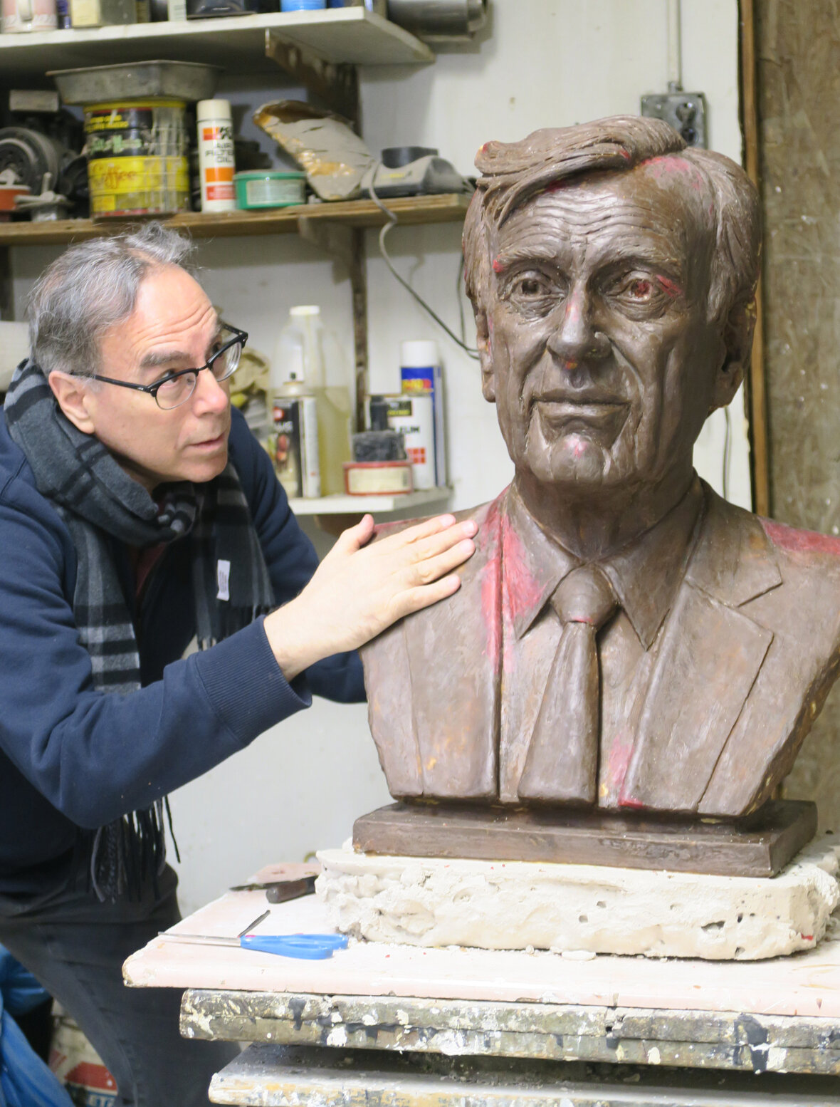 Final refining of the wax model for the bronze cast.