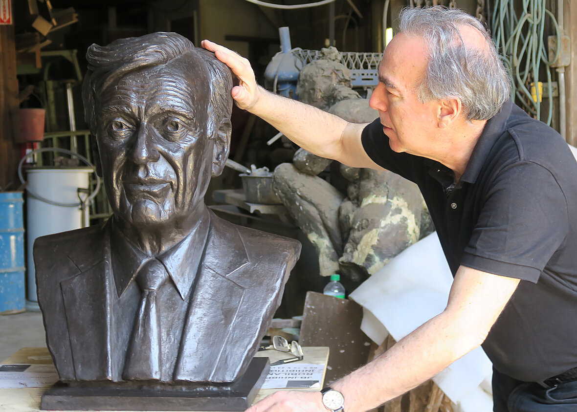  At the foundry, Marc inspecting the fine detailing of the Elie Wiesel Plaza bronze. 