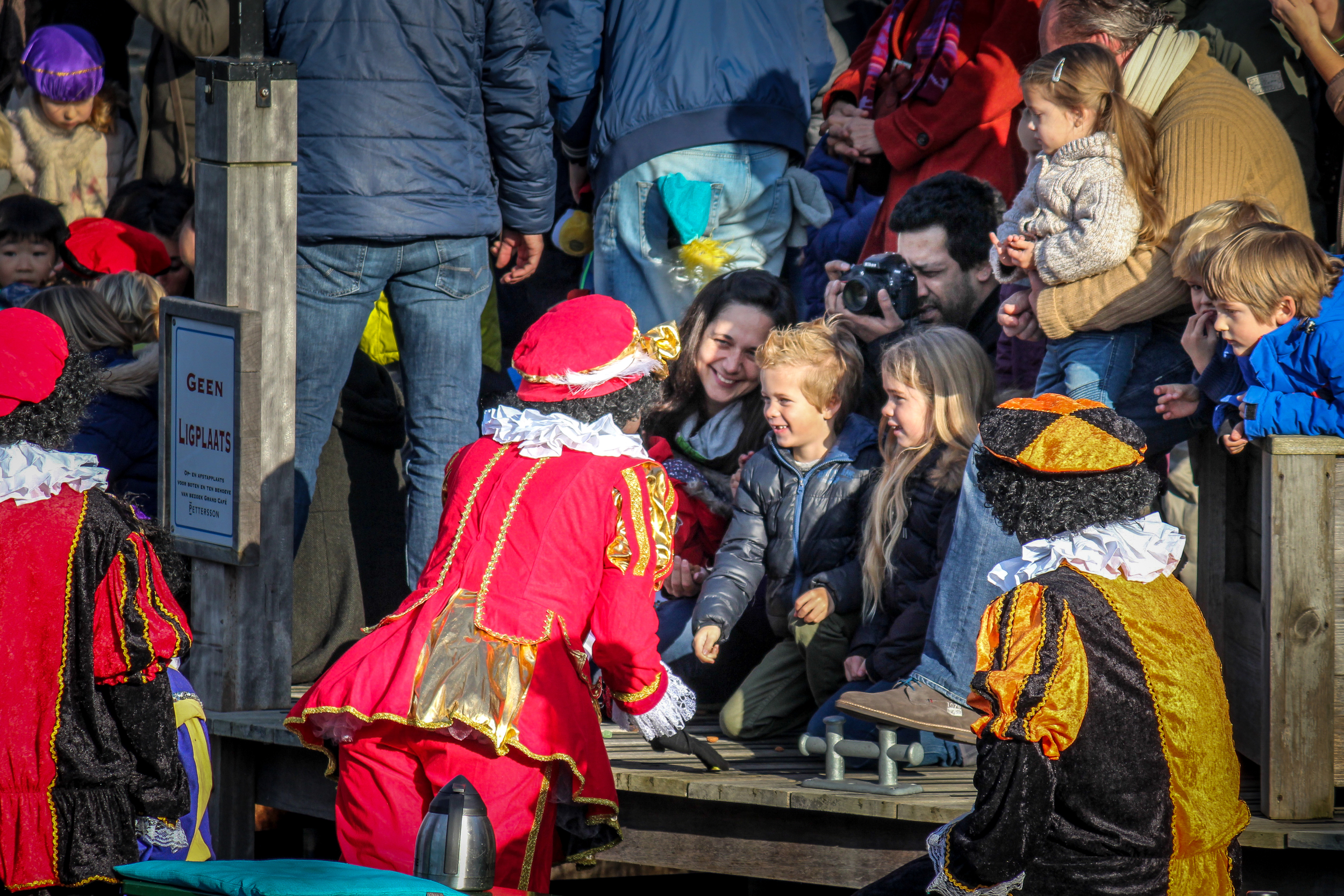 The Pieten greet the children and give them small ginger cookies called pepernoten . Many children have bags to collect their pepernoten in.