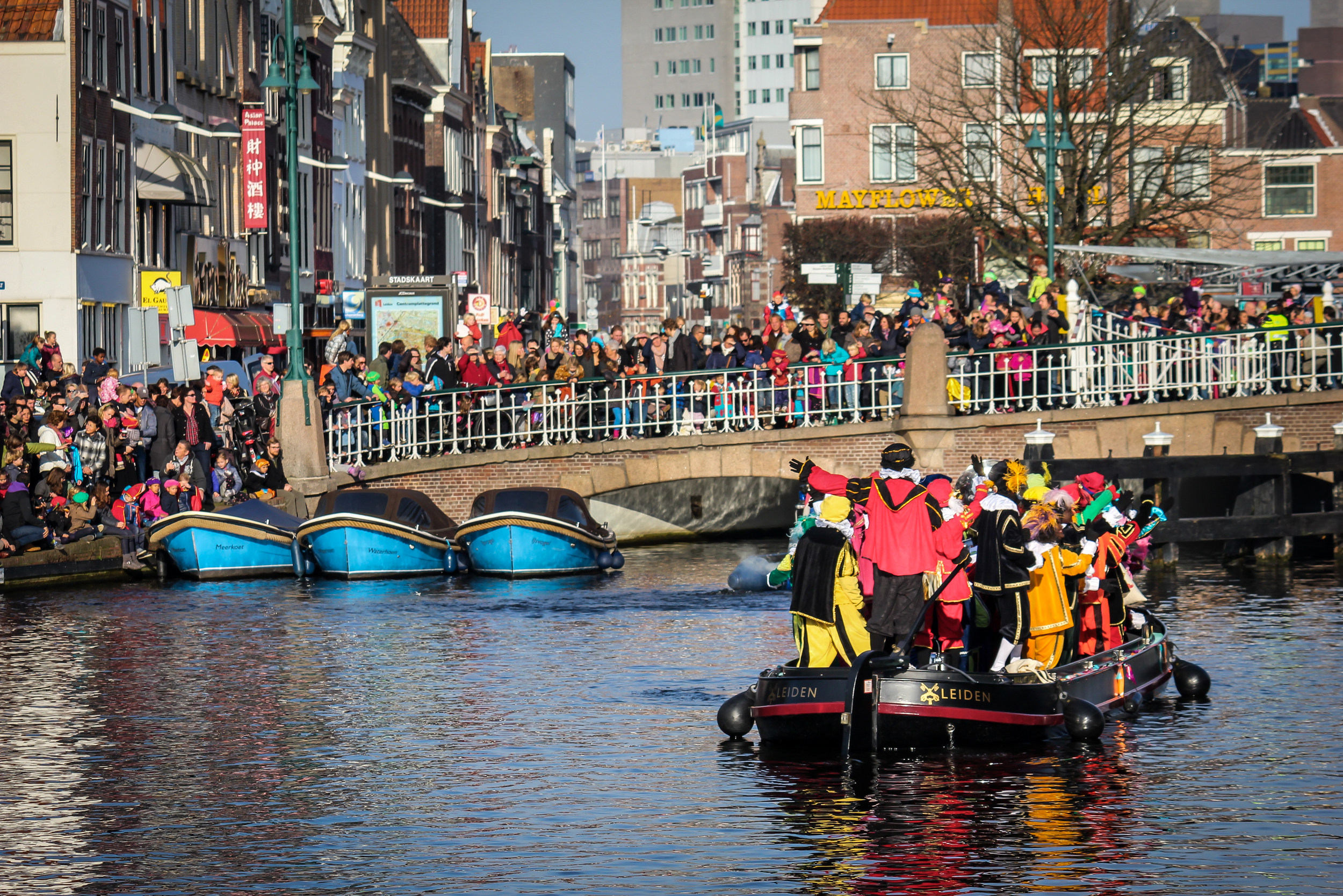The black Pete arrive into Leiden on boats while being greeted by the large crowds of families signalling the start of the celebration.