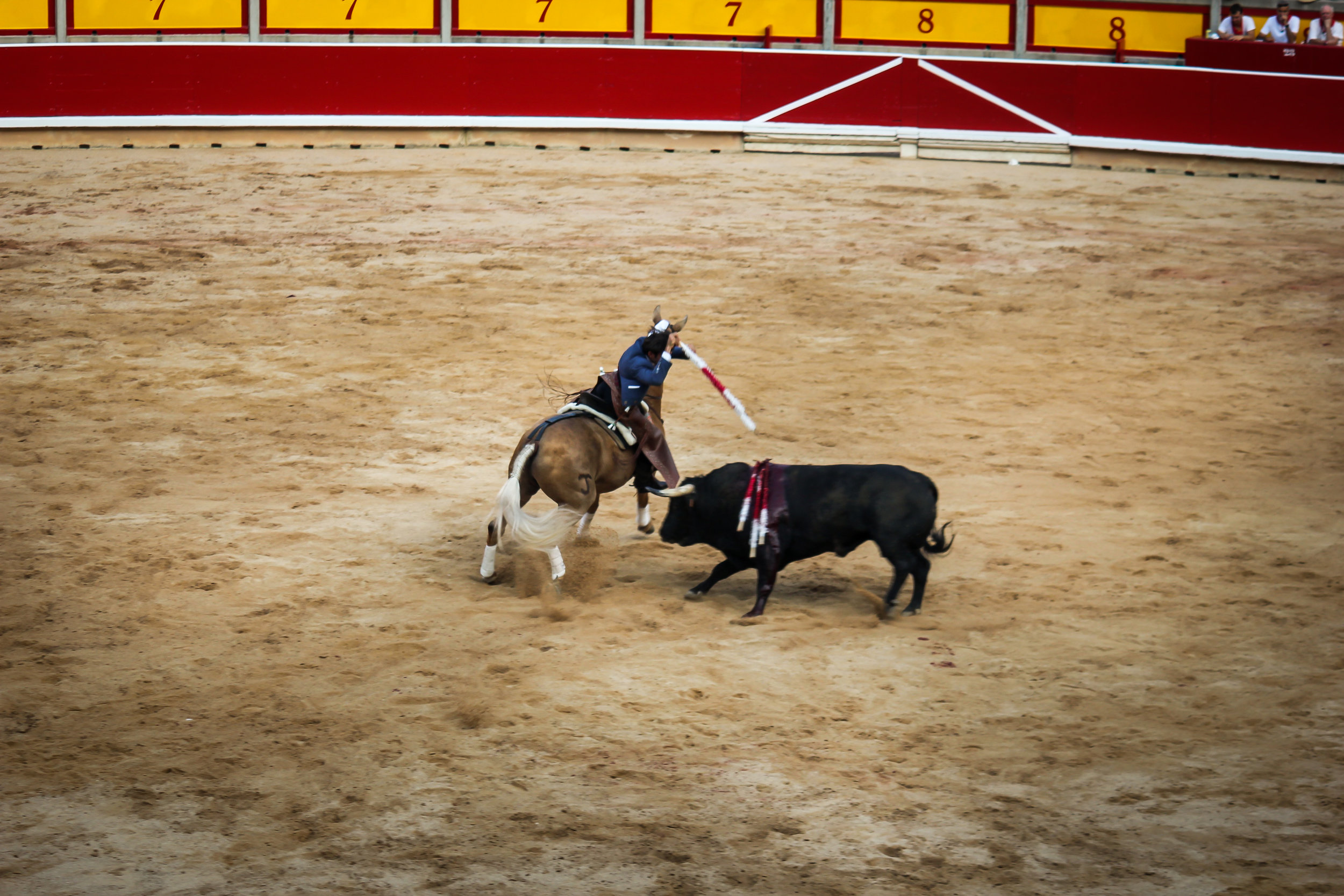 Successfully inserting the banderas. These moves often come very close to collisions with the bull.
