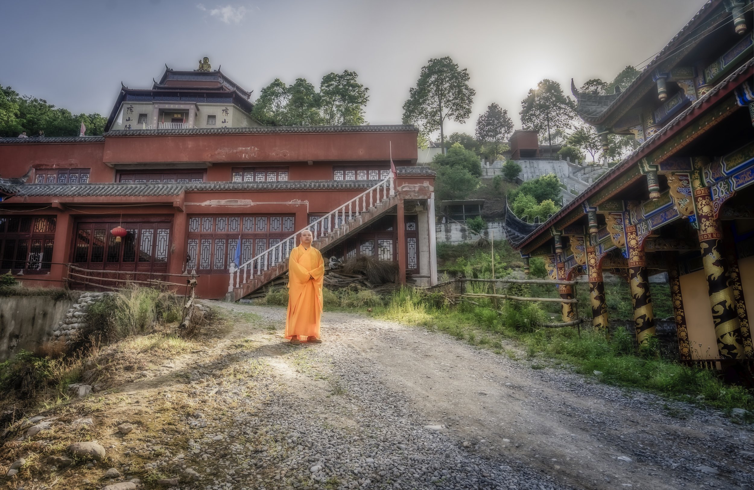  We decided to rent bikes for the day and cycled to new Beichuan from Mianyang. Somewhere in between these cities we found a temple nestled on the side of a hill. We decided to check it out but when we got there it seemed completely abandoned. After 