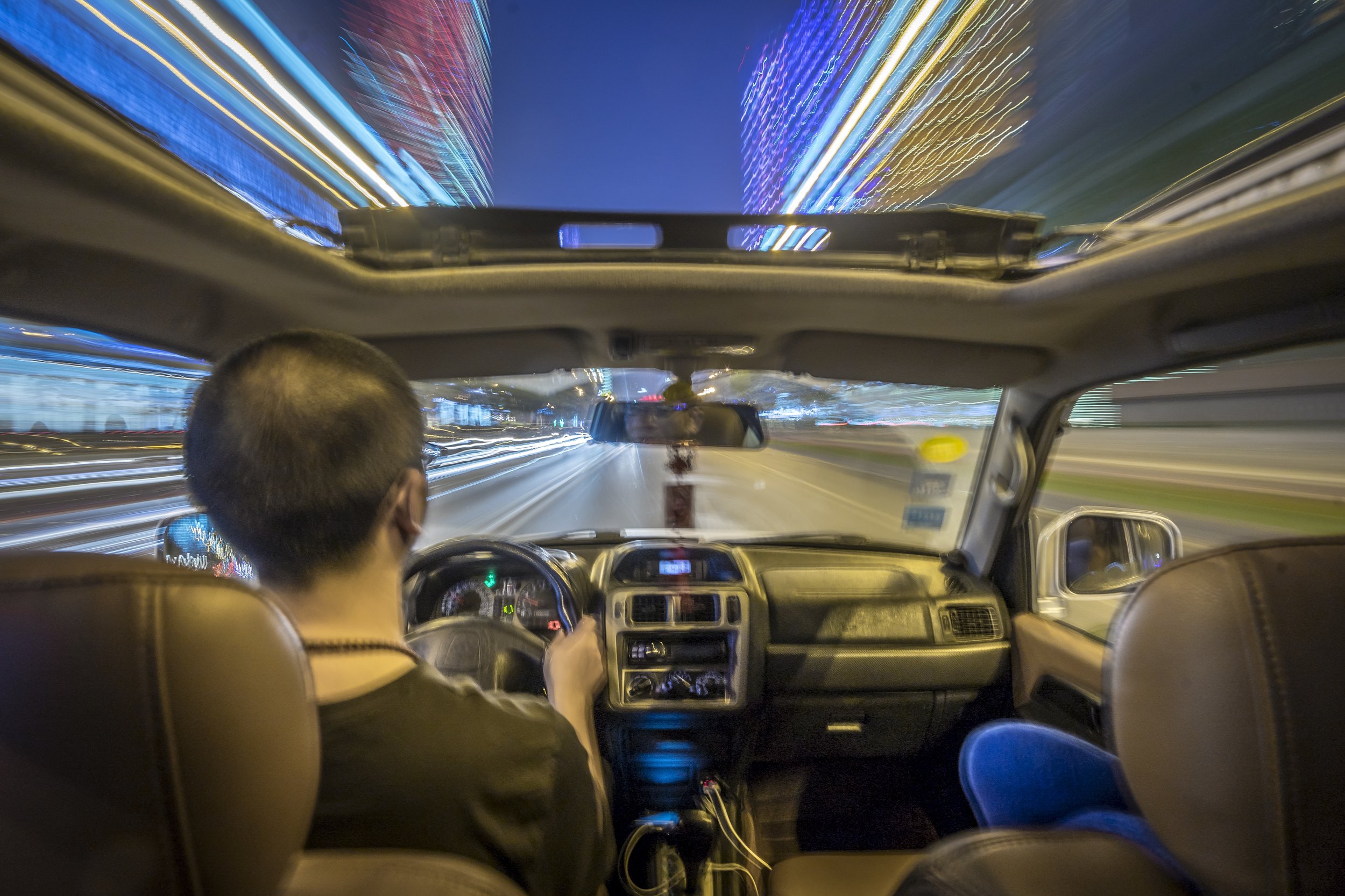  It took some time to adjust to the driving style in China with traffic laws being more a recommendation than rule. It was never a dull moment sitting in the back of a motorized vehicle. This photo was taken in Chengdu, most commonly known for its ad