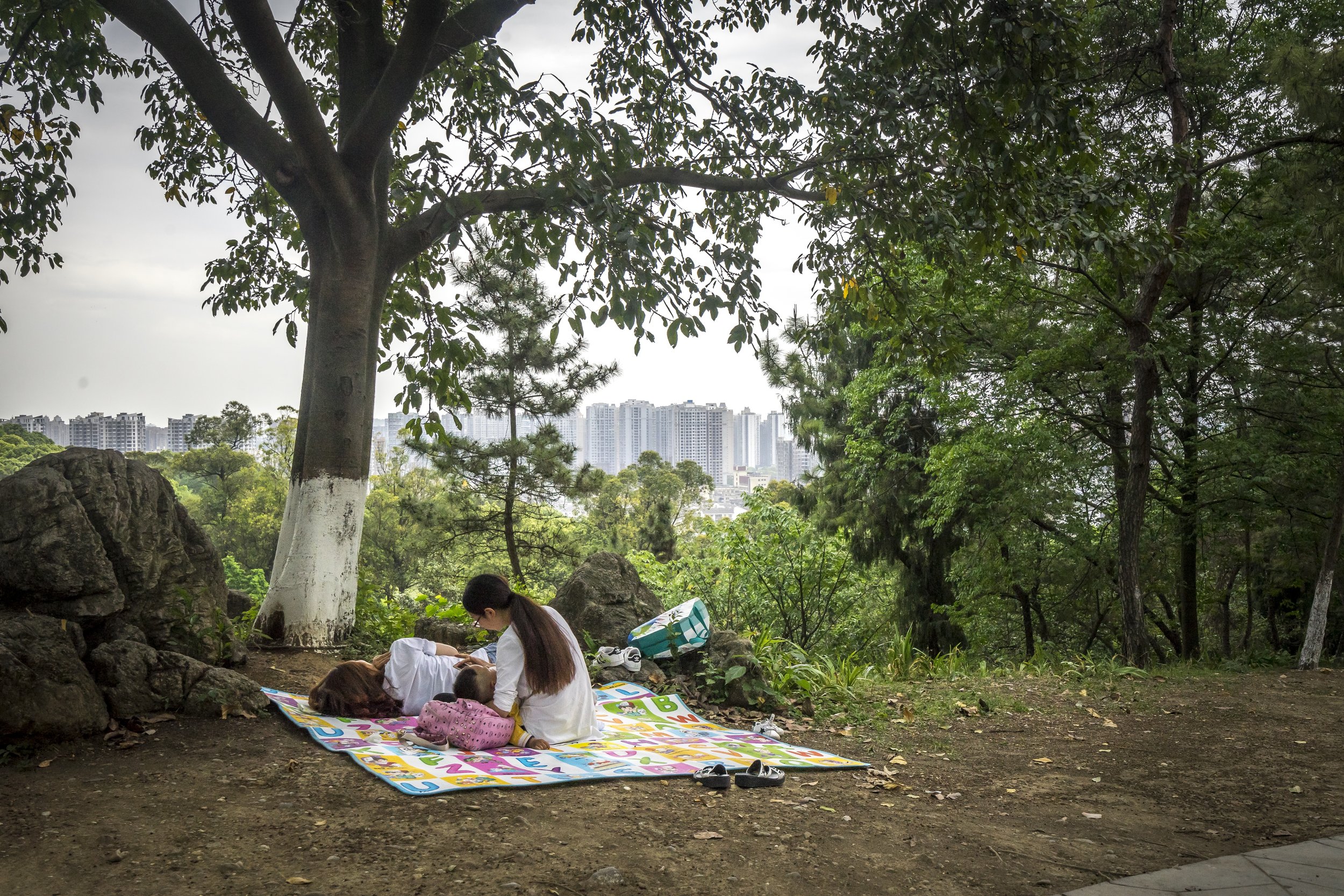  A local park in Mianyang provides residents with a space to relax and escape the hustle and bustle of the city. Views from this lookout have changed rapidly in the last few decades. China has moved quickly to build up the skyline by filling cities w