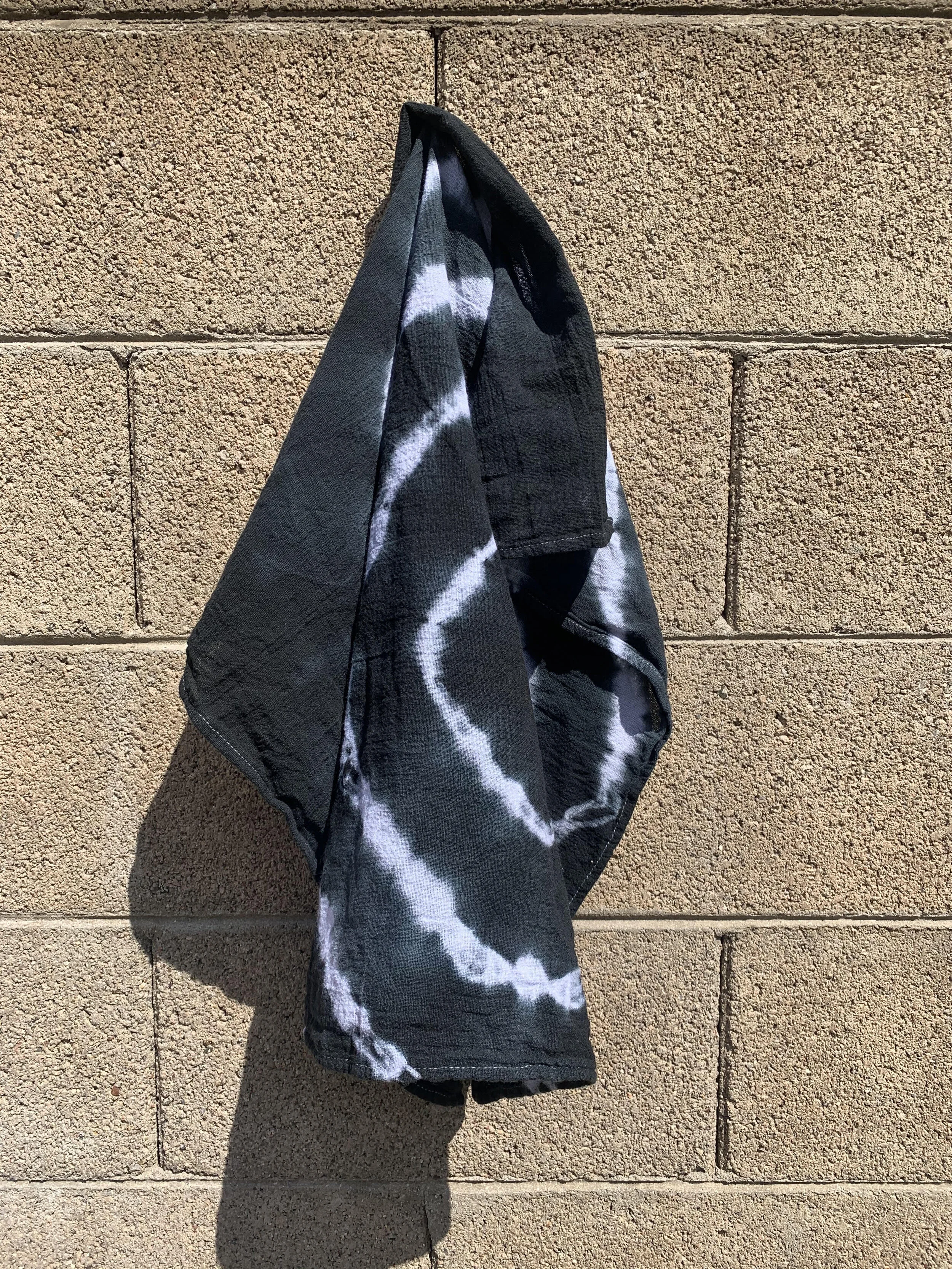 black towel outside.jpg