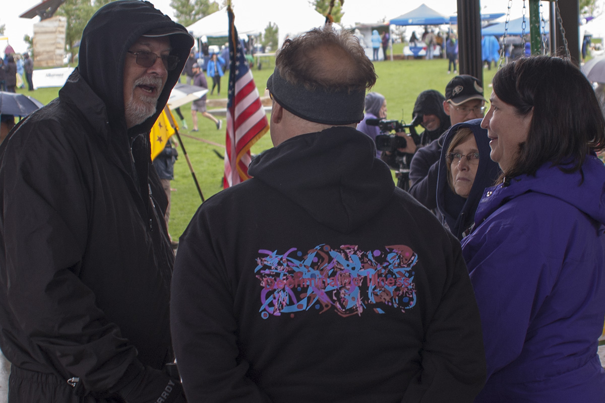 State Board Member Jeff Zinn, administrator David Garrity, and Executive Director Sarah Mooney at the 2018 NAMI Colorado Walk .