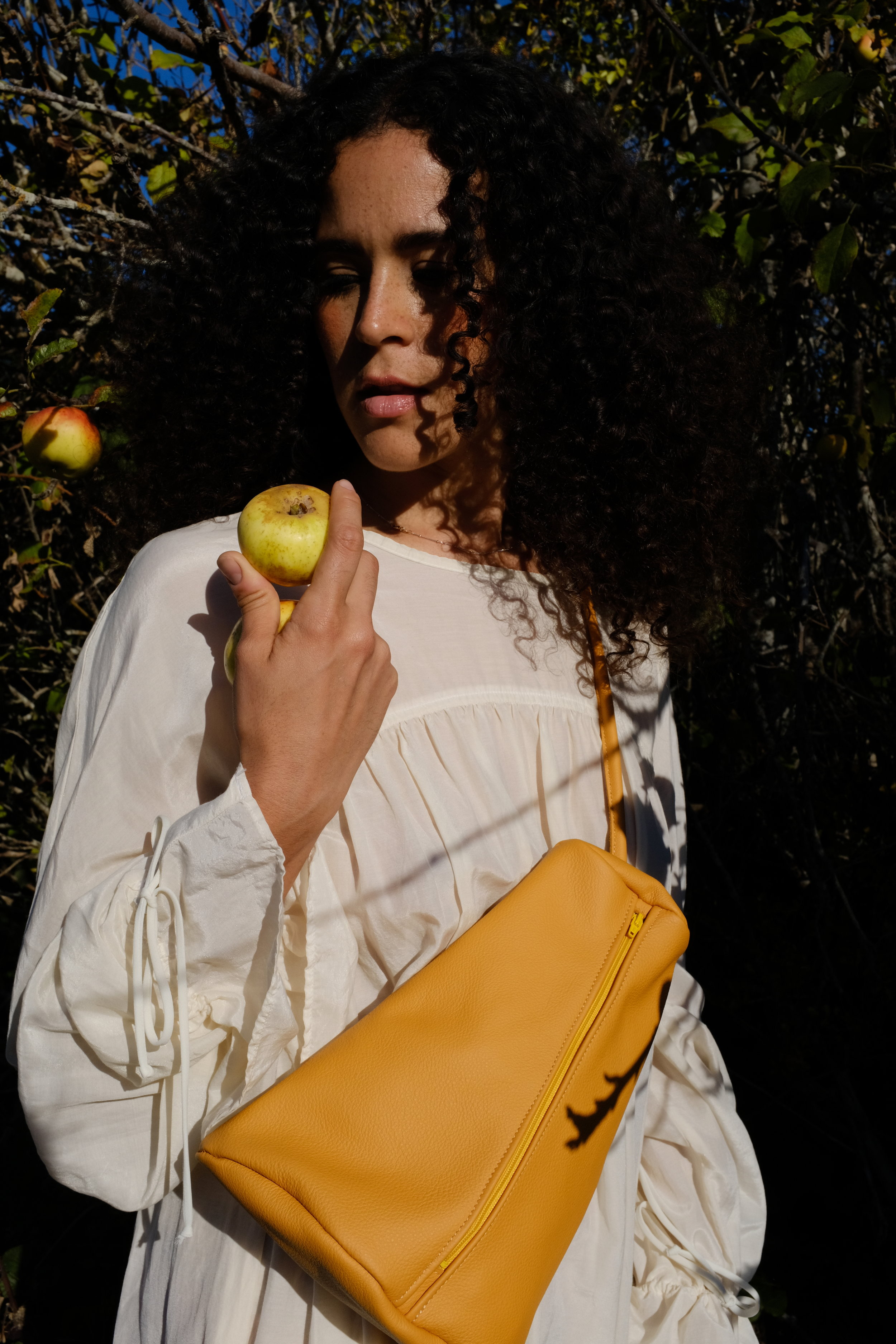 Turmeric soft leather sling purse