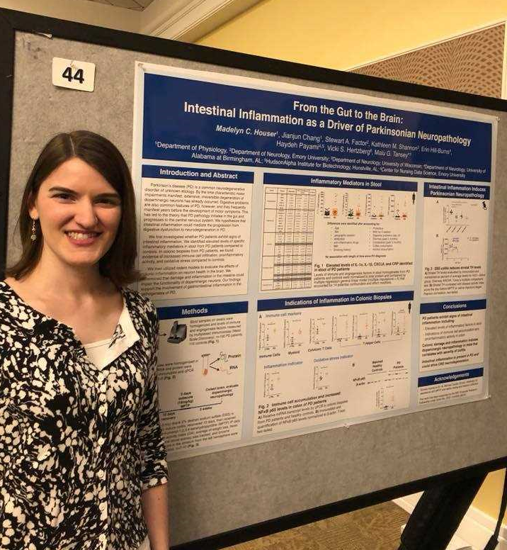 Madelyn Houser pictured next to her winning poster.