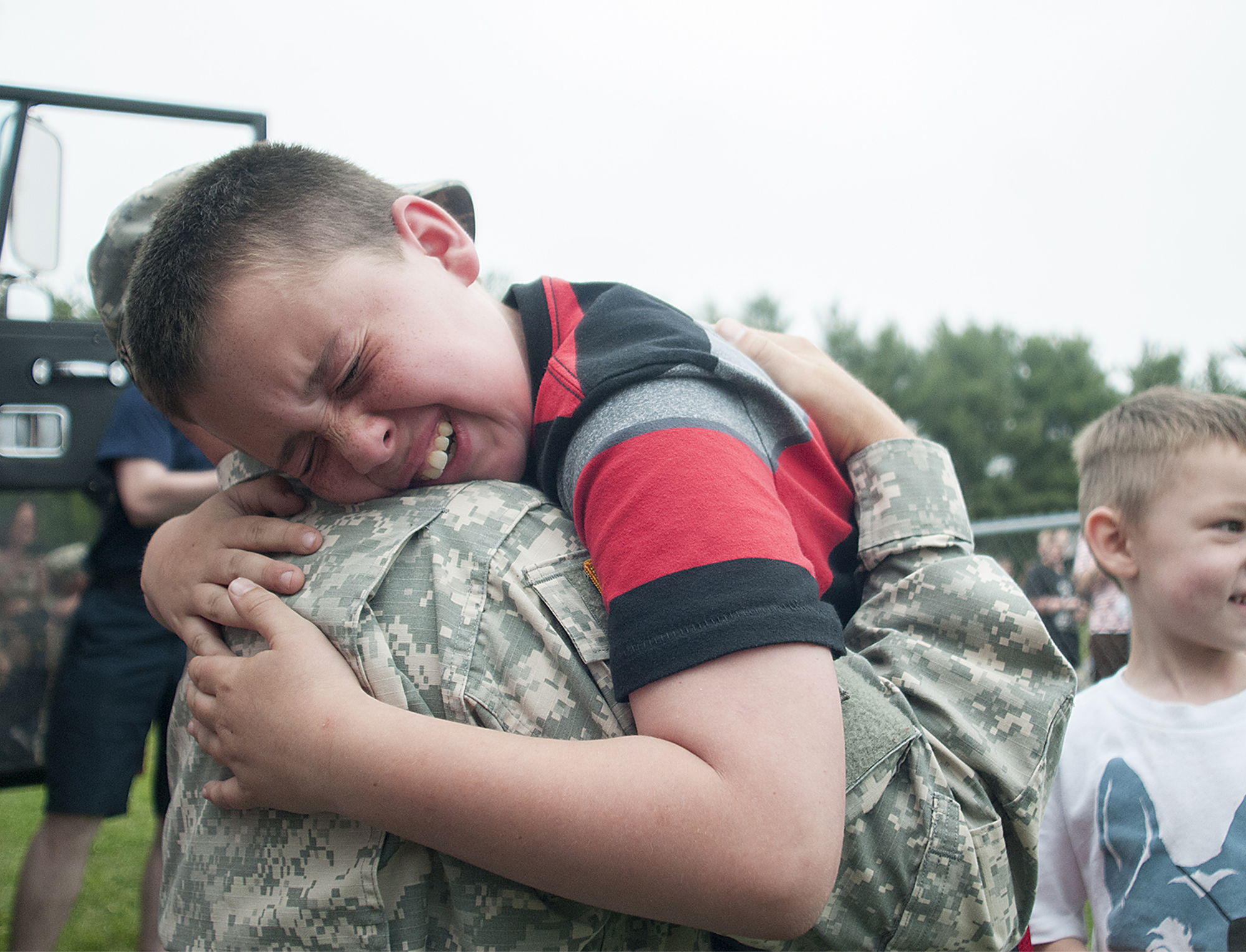 Len Cassidy III, 11, a 5th grader at Lower Southampton Elementary School, is overcome with emotion while hugging dad, Staff Sergeant Len Cassidy, 35, during a surprise homecoming on Monday, May 18, 2015, in which Principal Michelle Burkholder organized a routine fire drill for Sgt. Cassidy, who has been deployed for over a year, to arrive via firetruck.