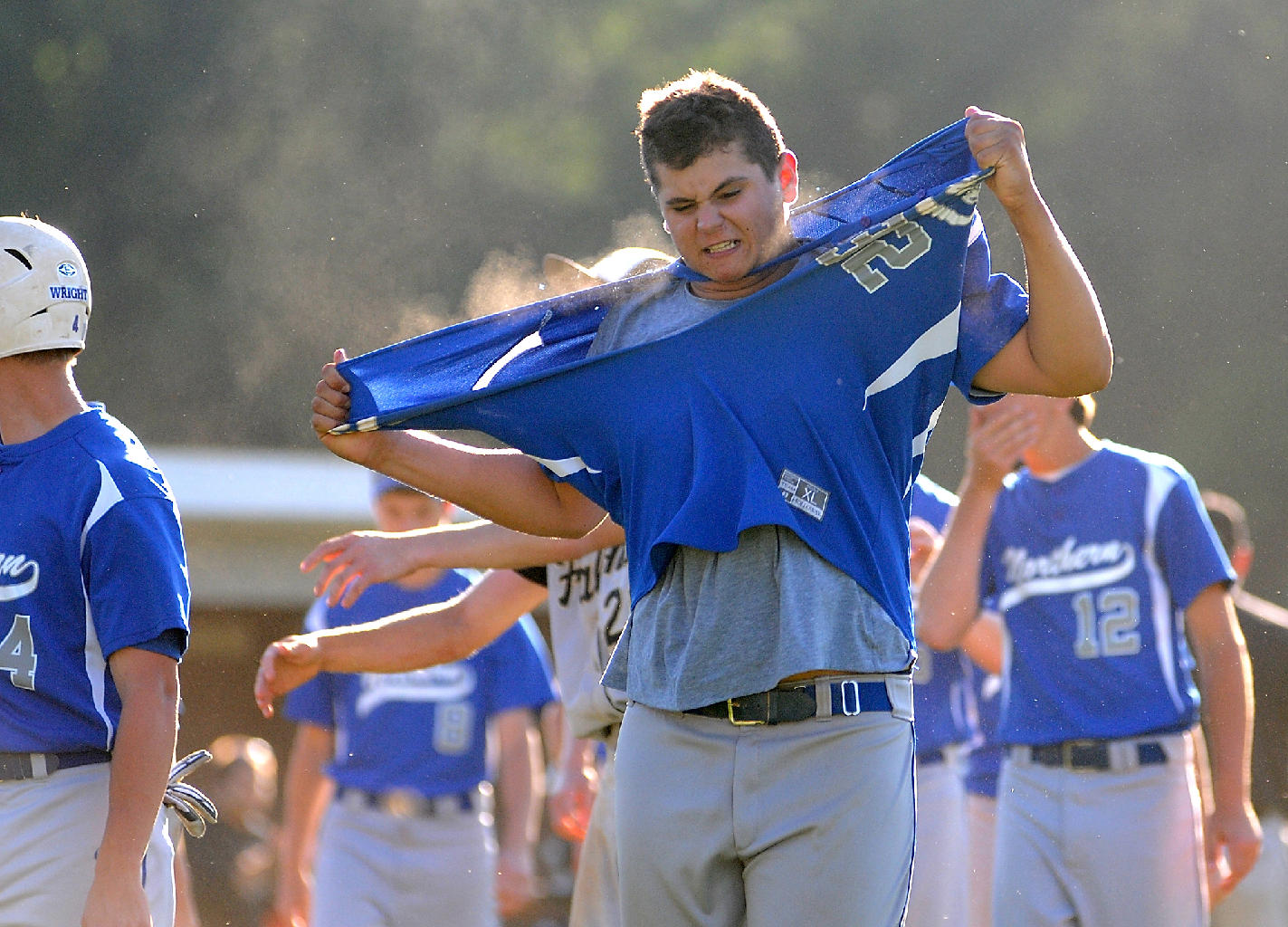  Northern Burlington's Zach Gakeler (32) rips his jersey immediately following their last out of the game, losing their state Group 3 semifinal game at Rider University in Lawrencville, NJ to Burlington Township. 