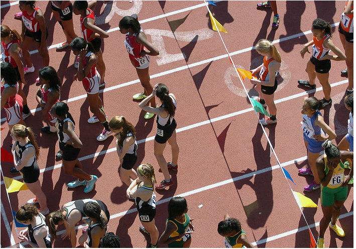  Girls competing in the Penn Relays line up before their races at the starting line at the University of Pennsylvania in Philadelphia. 