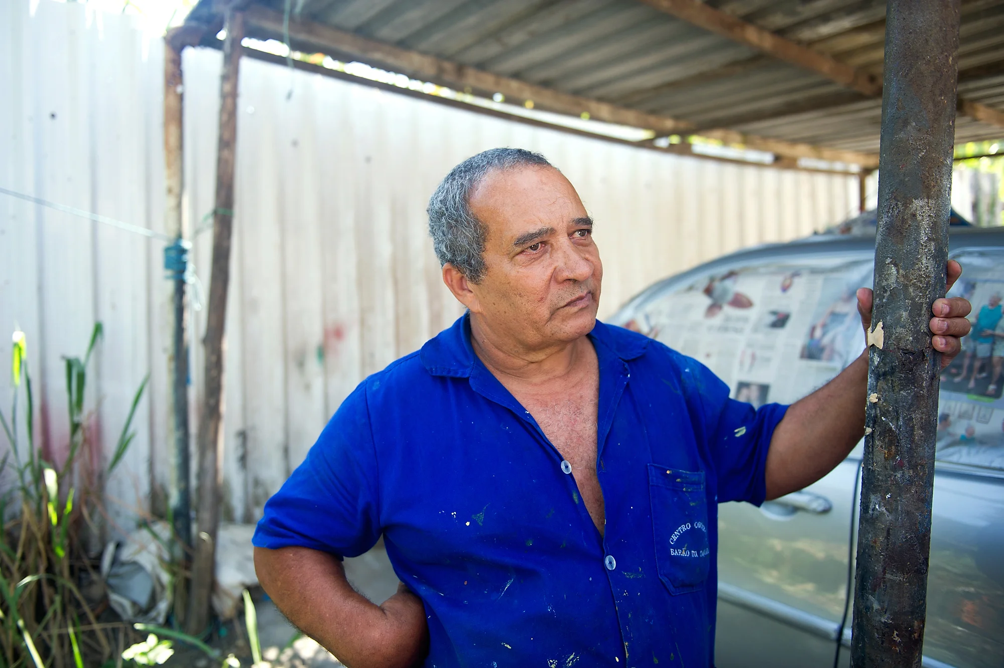 Painter Izaias Rosa lives in the town next to the area that Vila Autodromo has been proposed to be relocated to. He says that at night, they leave their doors open, but wouldn't be able to do that if the town moves next to his.