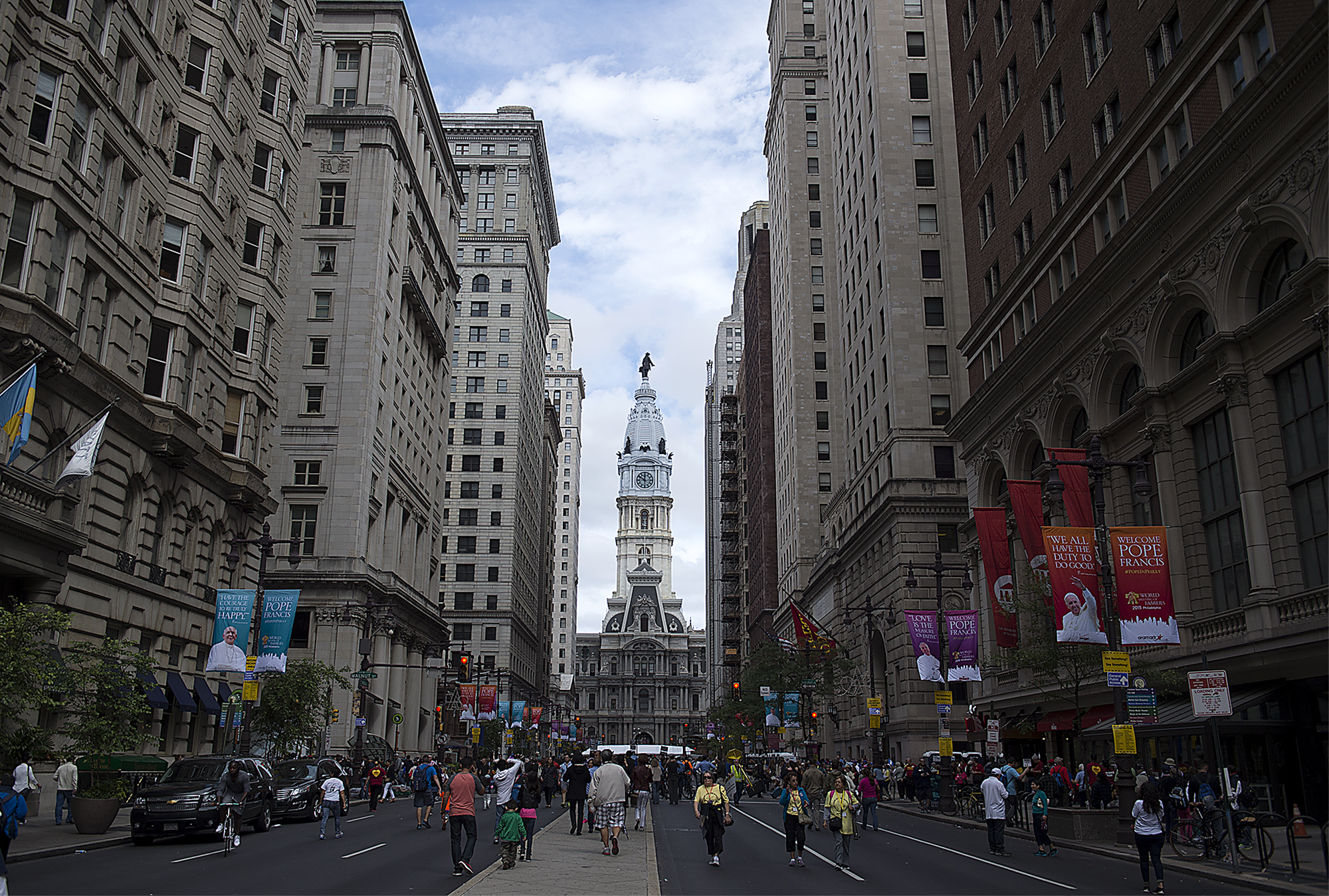  People walk near city hall before Pope Francis held Mass on the Ben Franklin Parkway on September 27, 2015. 