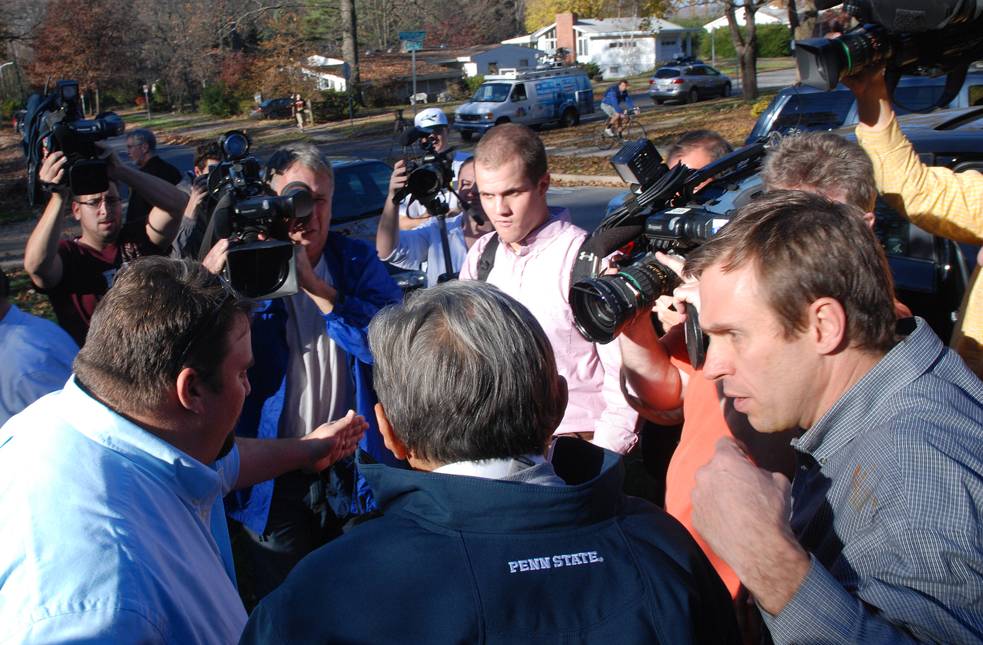  Former Penn State Head Football Coach Joe Paterno is helped into his car by his son Scott while leaving for practice on Tuesday, November 11, 2011 outside of his home in State College after his weekly press conference was cancelled. 