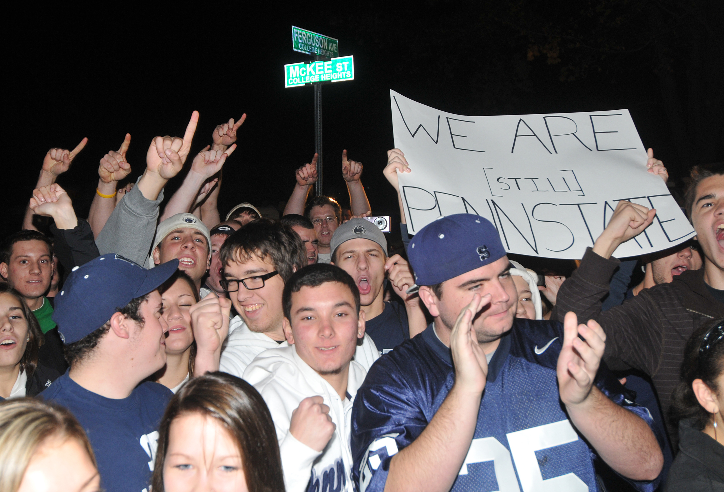  Students gather outside of head coach Joe Paterno's home in State College on Tuesday, Nov. 11, 2011 to await his arrival home from football practice. A group of about 300 students gathered outside the home in support of Joe Paterno. 