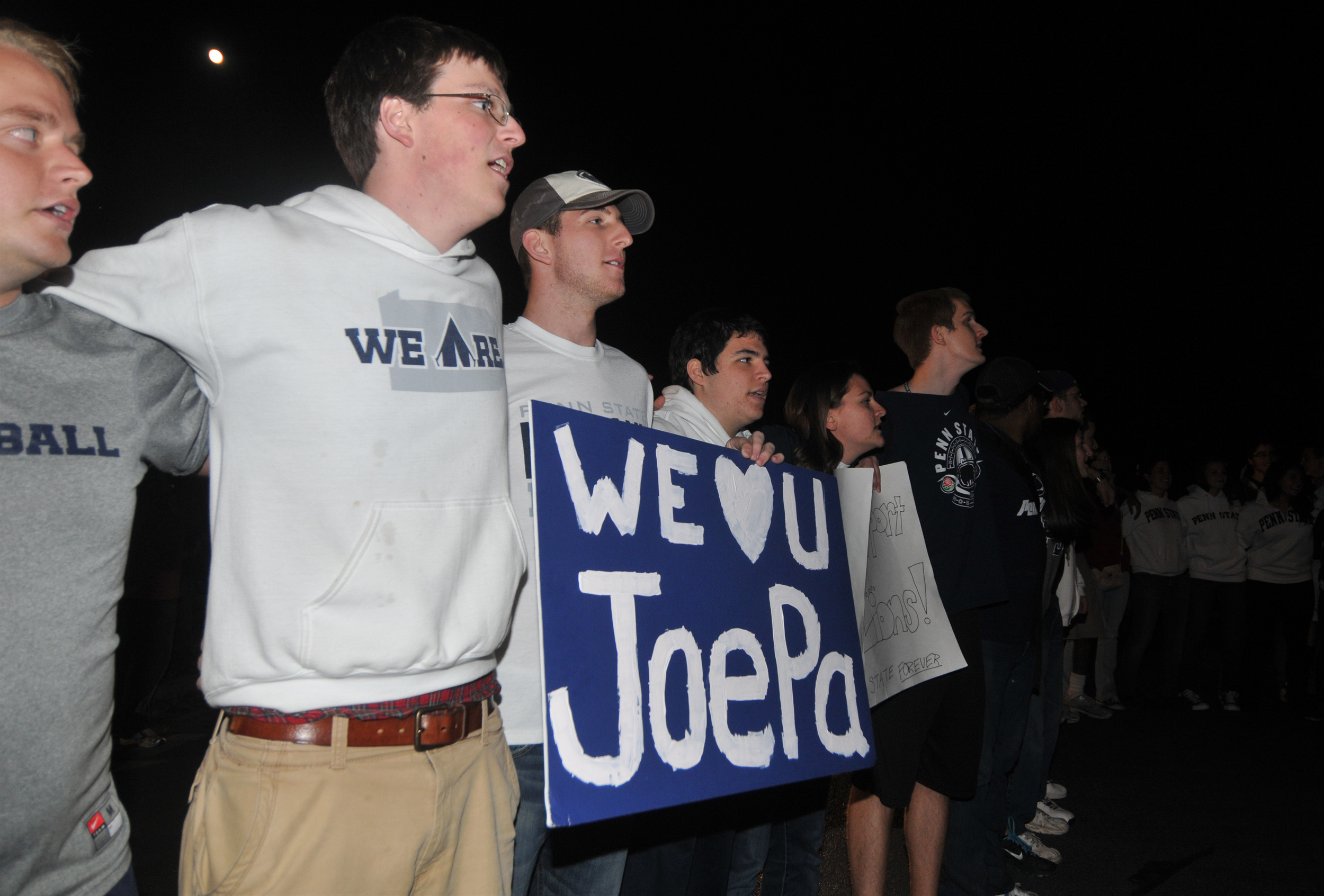  Students sing the Alma Mater outside of Joe Paterno's house on Tuesday night. About 300 students gathered in support of Paterno. 