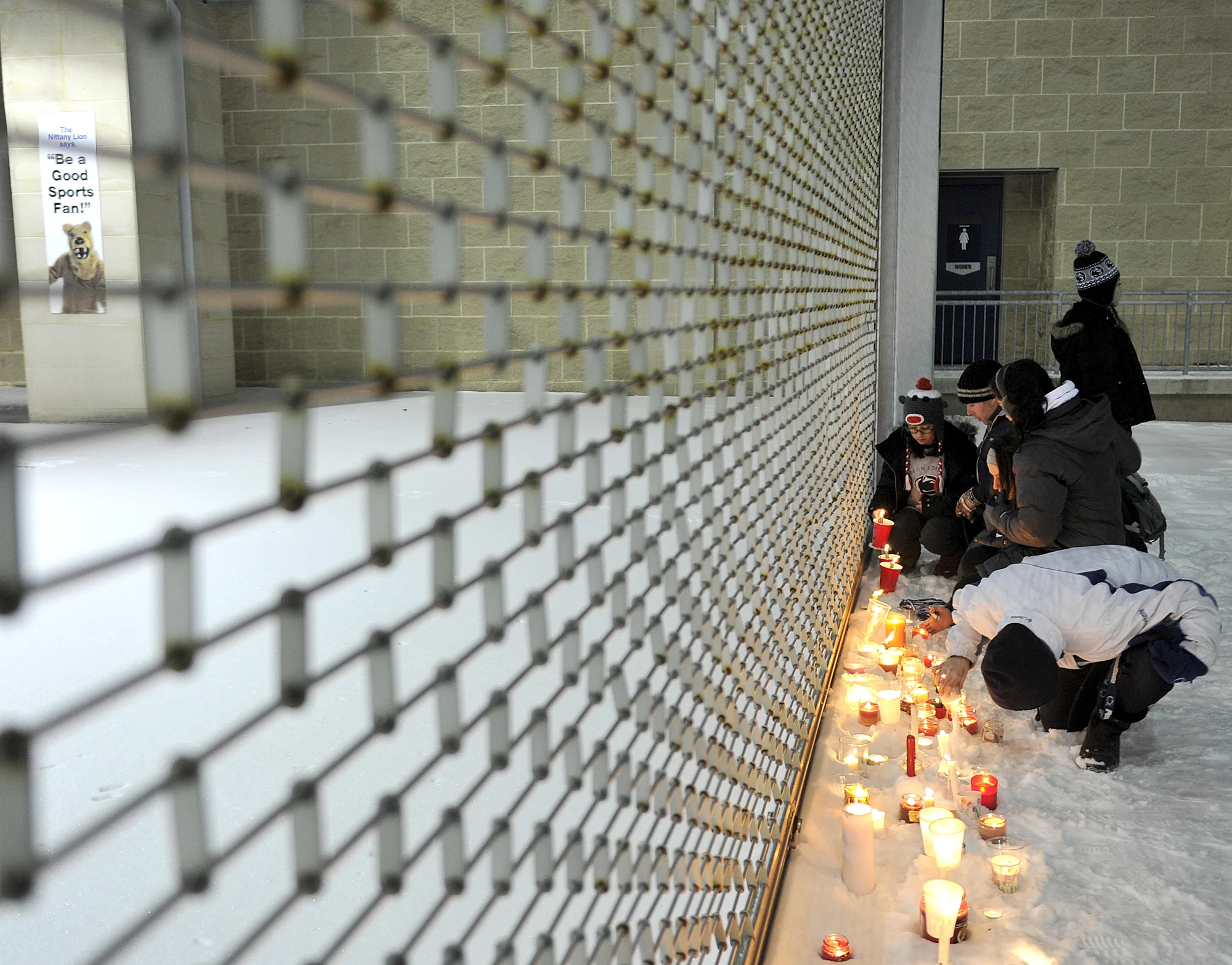 Candles line student section Gate A on Sunday, Jan. 22, 2012 after the candlelit vigil at Old Main for the passing of former Head Fooball Coach Joe Paterno.