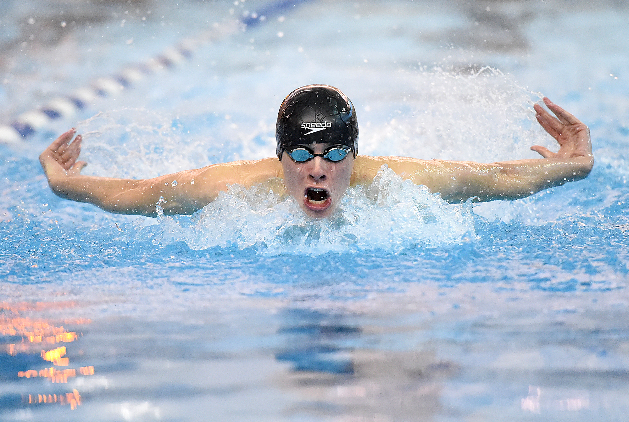  Council Rock South's Andrew Ridings swims the 100-yard butterfly during their swim meet at Council Rock North in Newtown Township. 