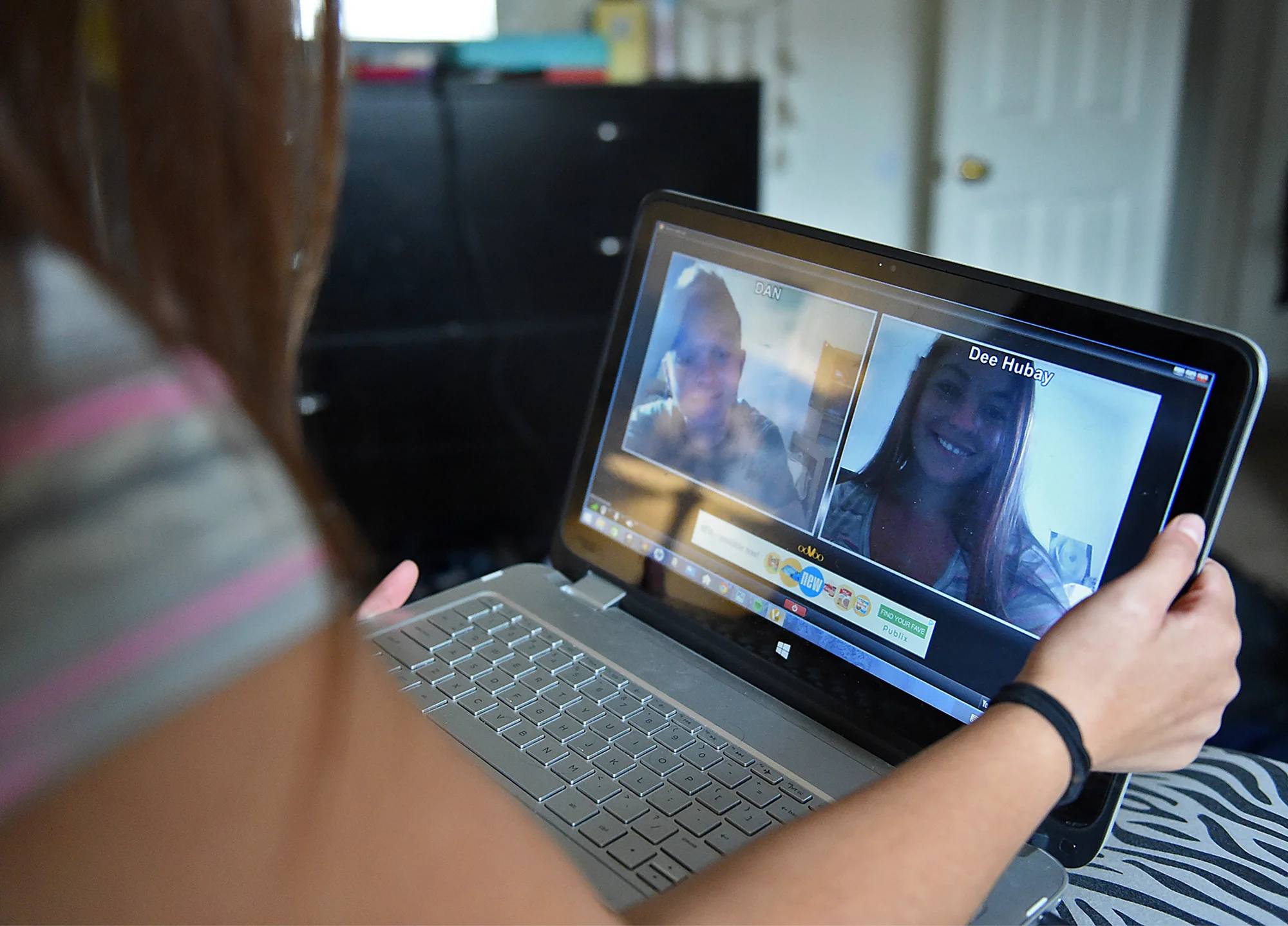  Dee Hubay video chats with fiancé Dan Bryan during a party at her mom's apartment in Northeast Philadelphia before she left for boot camp on Sunday, August 23, 2015. Bryan was still at his MOS school. 