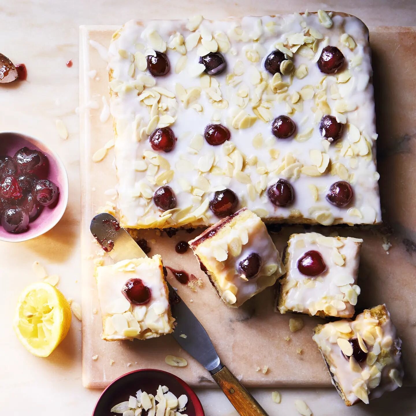 The cherry on the cake 🍒 

If you're an avid baker and want to impress, this is the traybake for you! Buttery pastry, tangy cherry jam and squishy almond frangipane, topped with a thick icing with a hint of lemon and of course, a handful of glac&eac