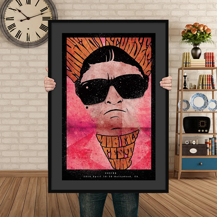 Man-Holding-Poster-Mockup_1.jpg