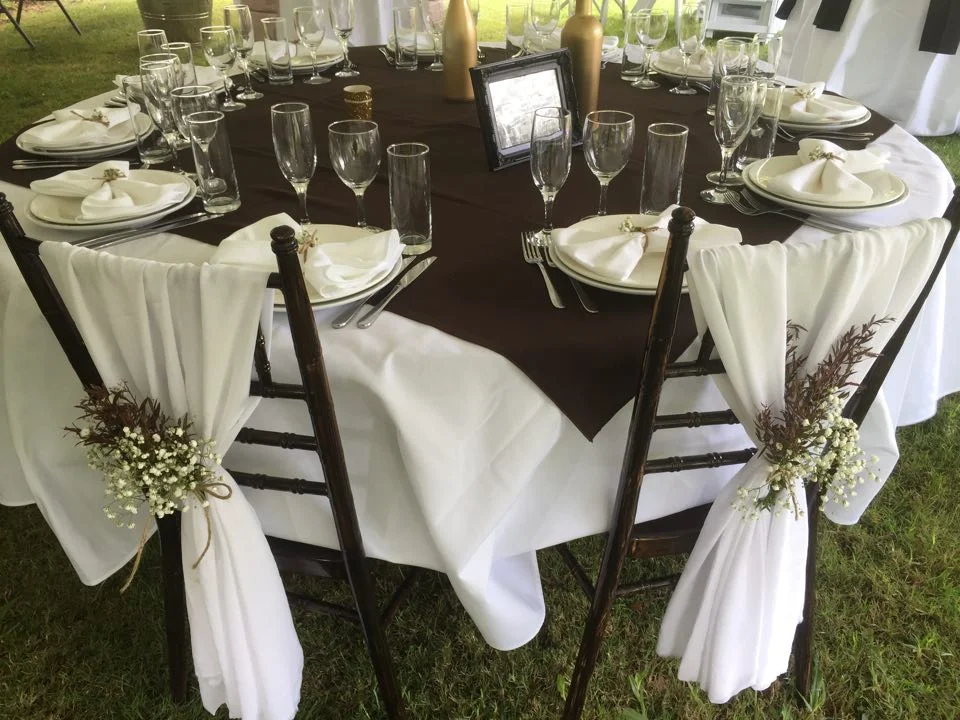 Brown tffany chair with chiffon draping.jpg