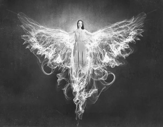 bigstock-Attractive-woman-with-angel-wi-1117365471.jpg