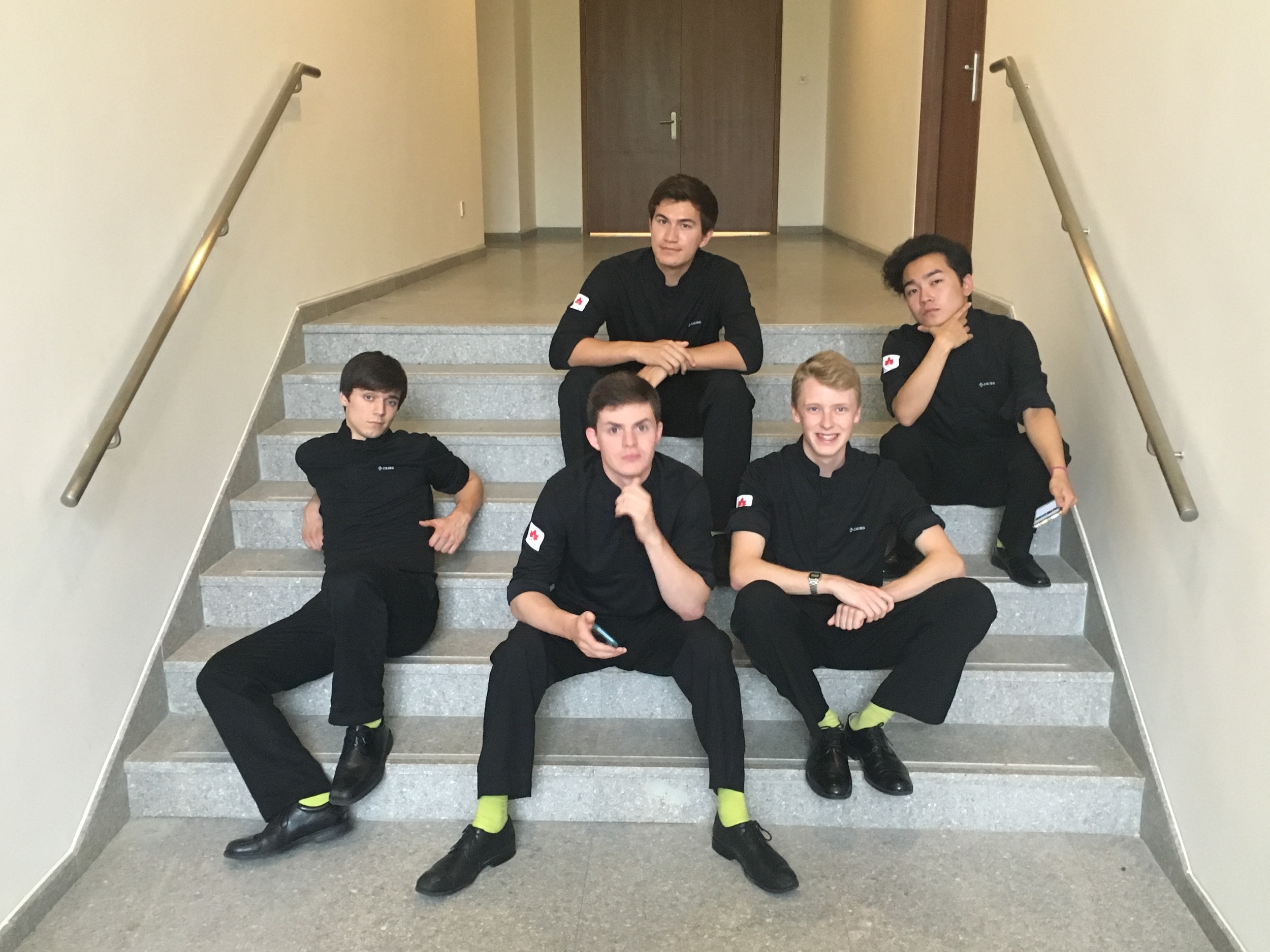 Striking our best boy-band poses in shirts generously given to us by the CEIBS Maple Choir