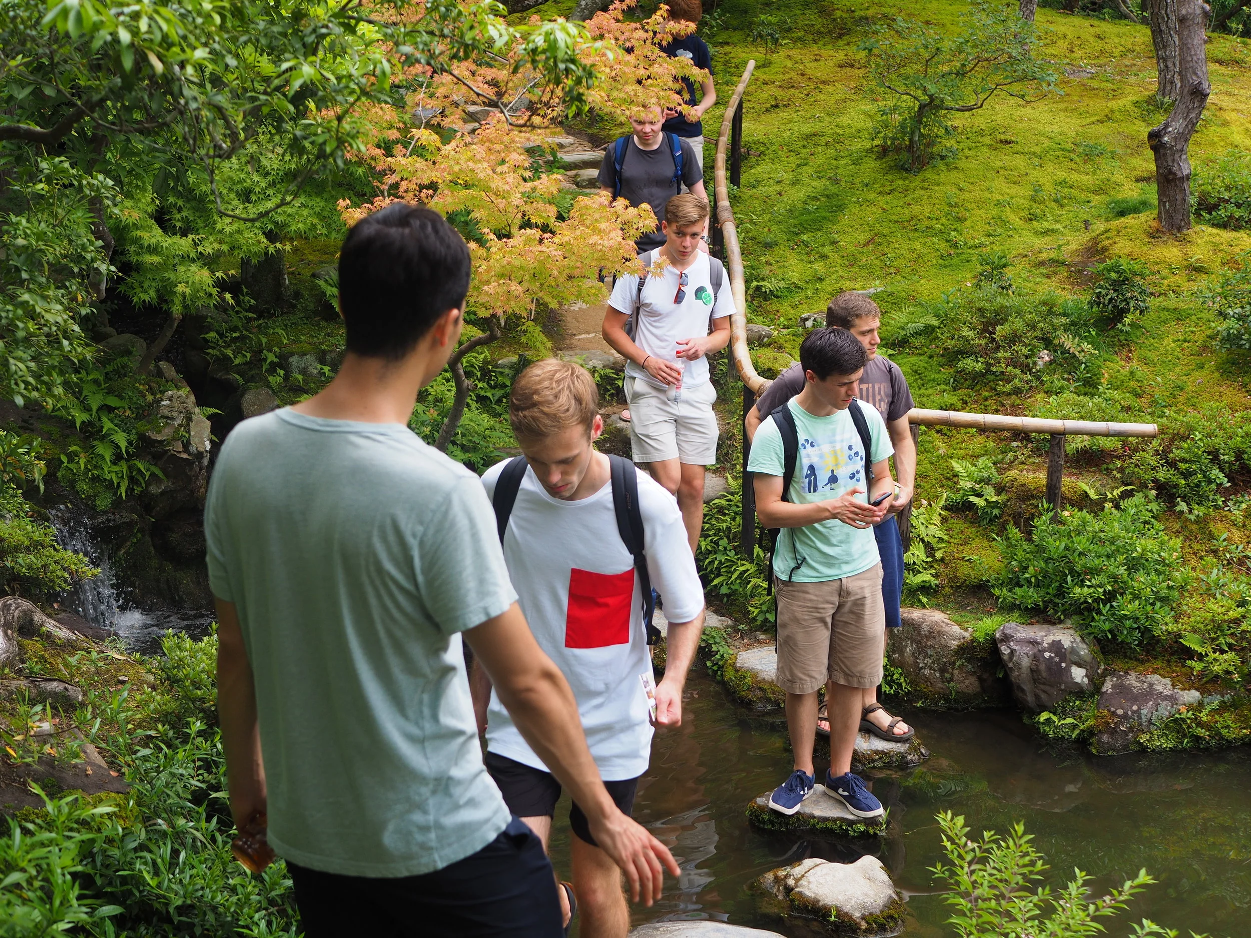 Dinny Dins led by fearless leader Lee Seligman #203 through a peaceful Japanese garden in Nara.