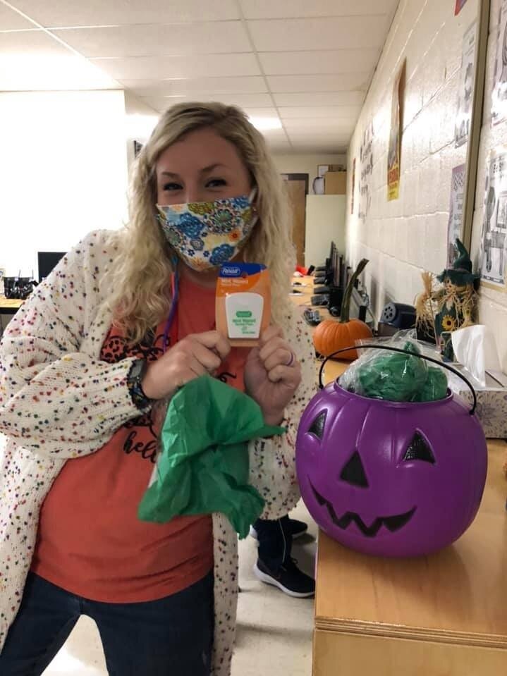 A staff member with the Purple Pumpkin