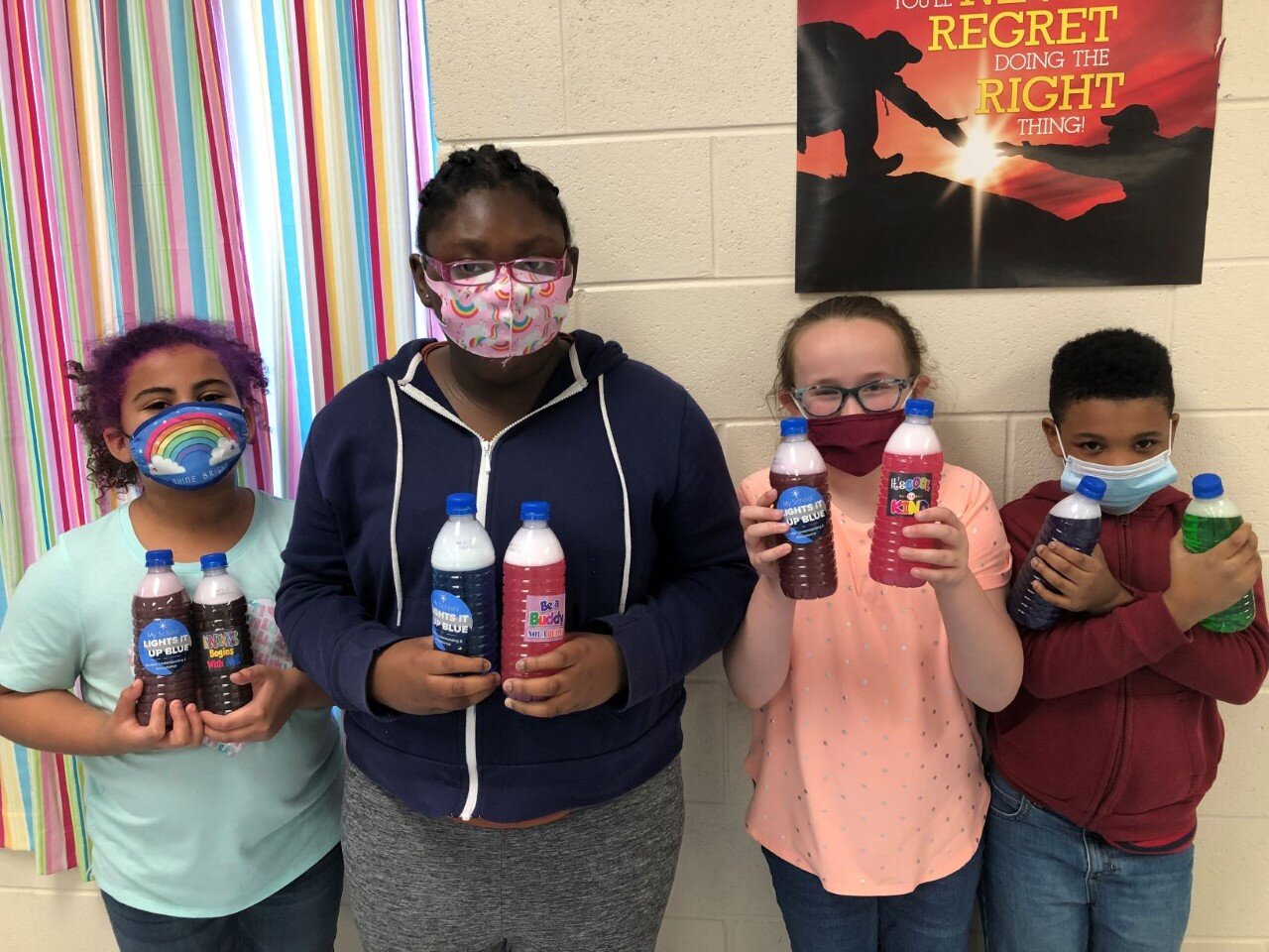 Kindness Club students with sensory bottles