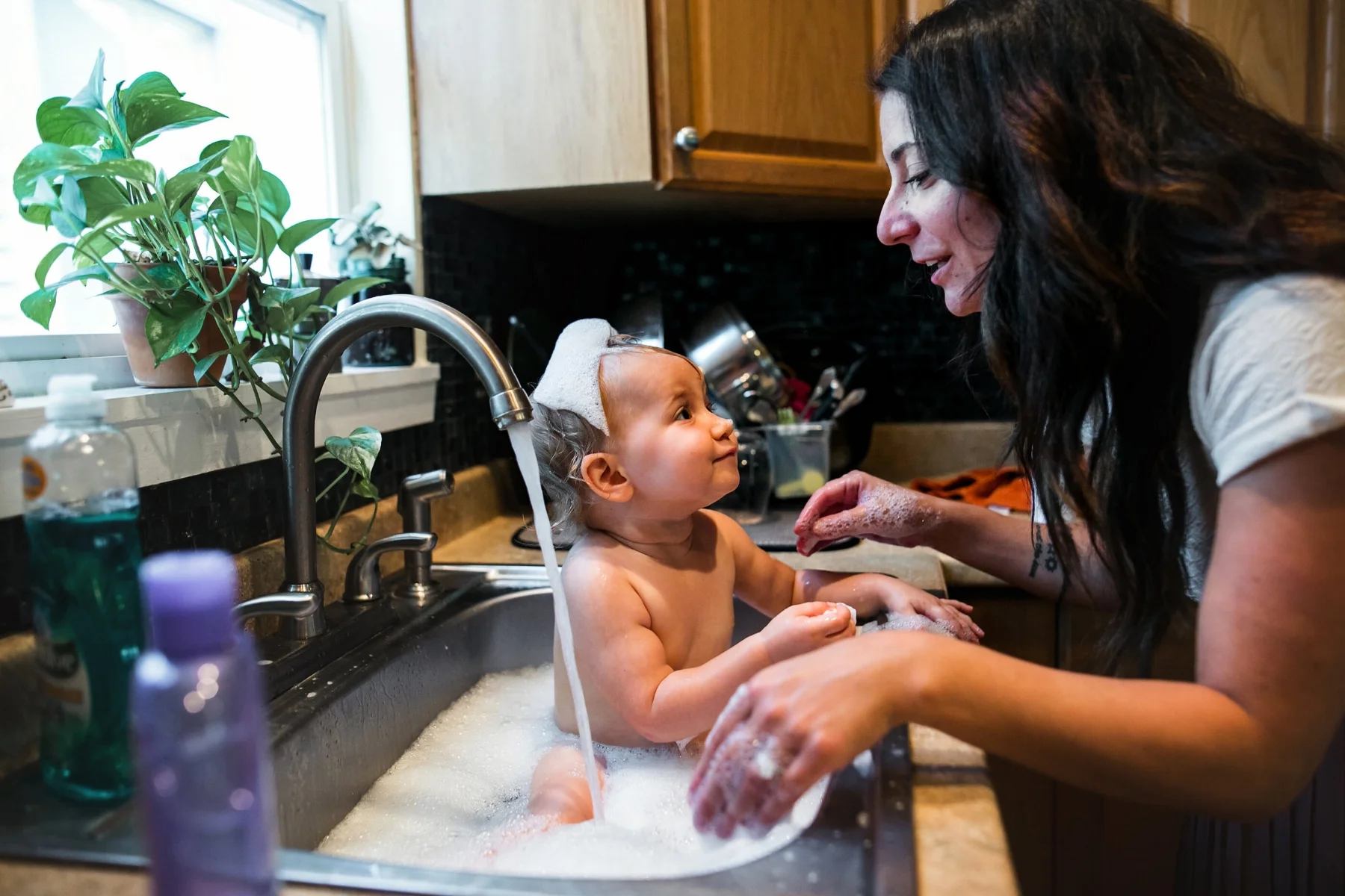 Babies bathing in sinks are simply the best! And it's the only way to get all that sticky waffle off.