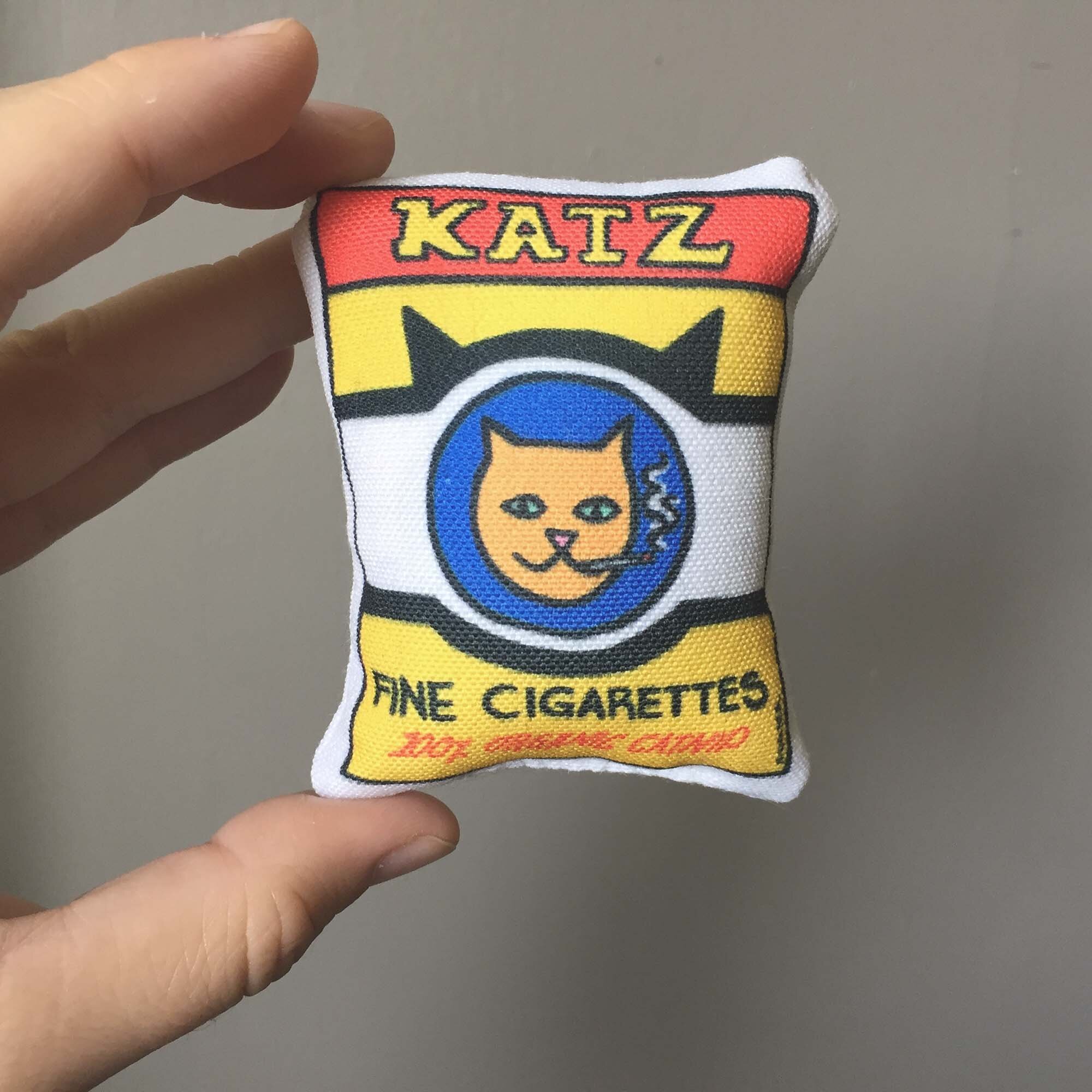 CatToySmokesWEB.jpg