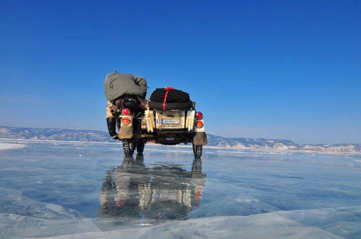 Ural side cart bike on Ice of Lake Baikal, photo by Hubert