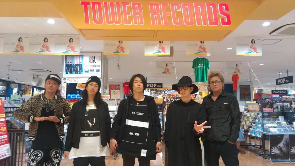 lynch. members at their own in-store appearance, showing off their sads T-shirts